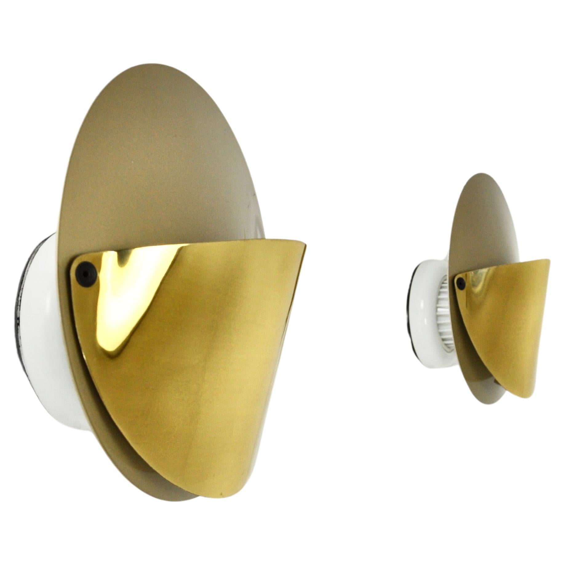 Pair of gold coloured metal sconces by Achille Castiglioni. Stamped Flos. Wear due to time and age of the sconces.