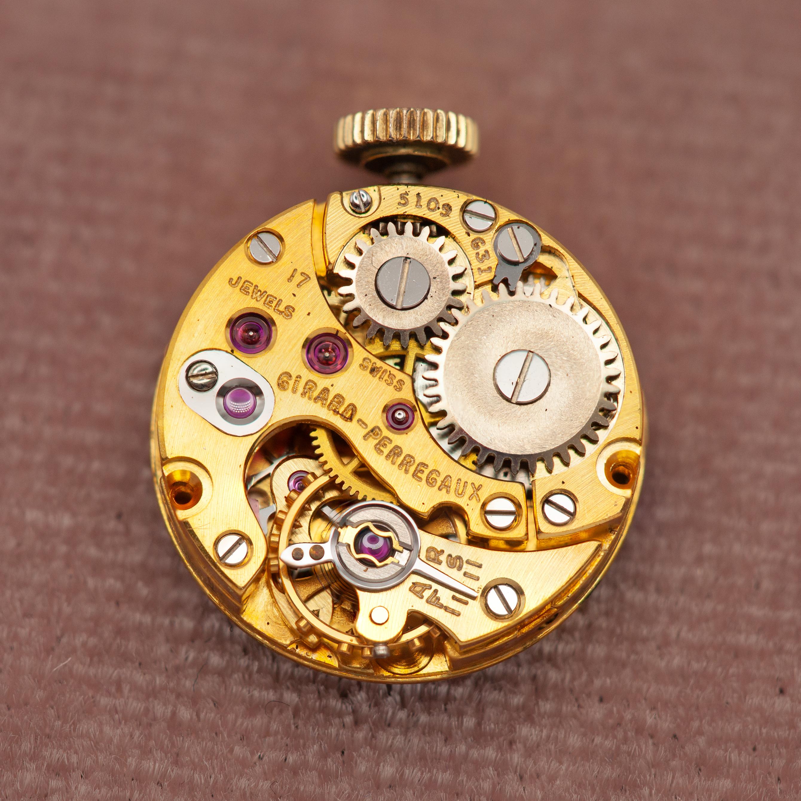 Girard Perregaux, orologio con bracciale a quadrante nascosto in zaffiro e diamanti, 18 carati/platino 9