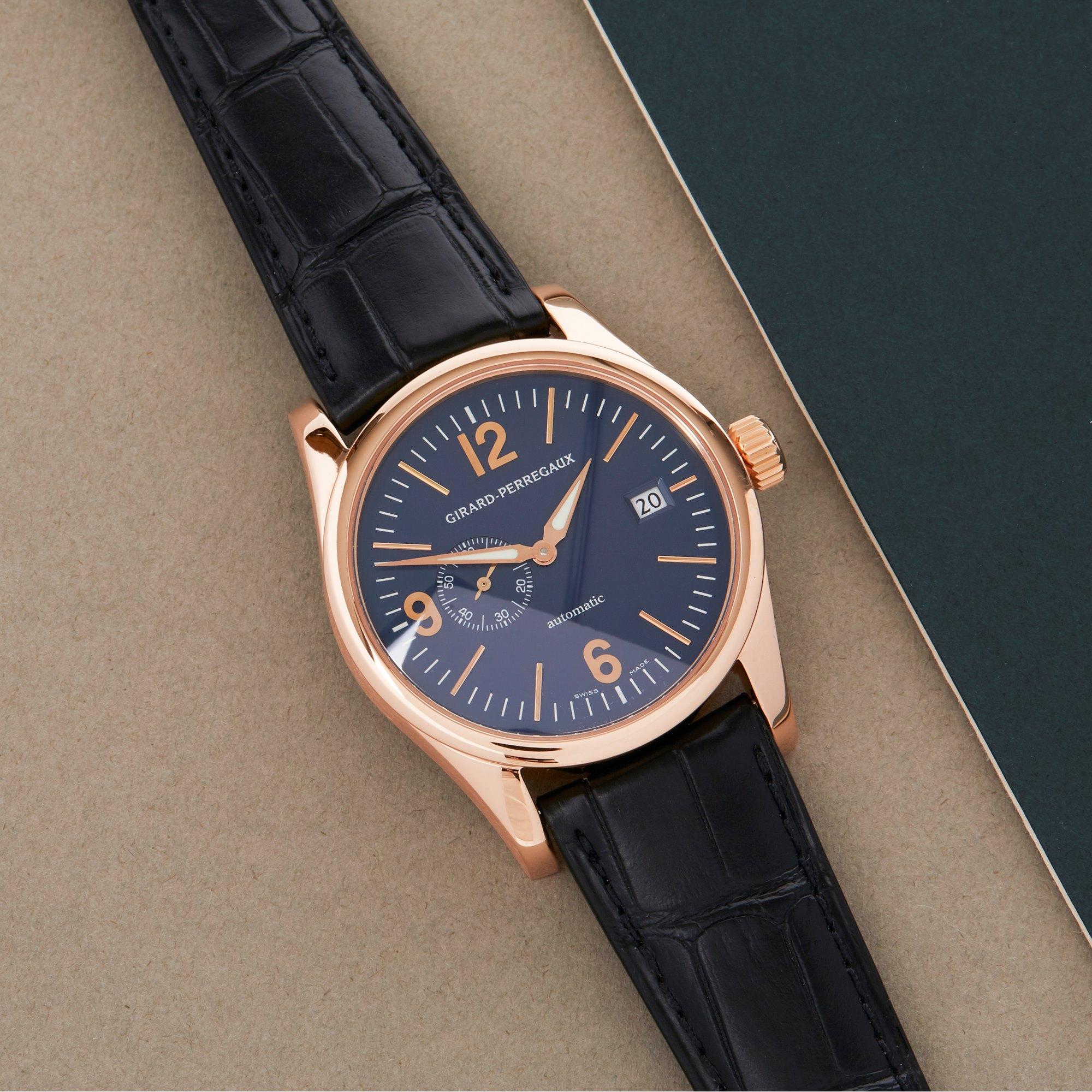 Xupes Reference: COM002429
Manufacturer: Girard Perregaux
Model: 1966
Model Variant: 0
Model Number: 4952
Age: 2010
Gender: Men
Complete With: Xupes Presentation Box 
Dial: Blue Other
Glass: Sapphire Crystal
Case Material: Rose Gold
Strap Material: