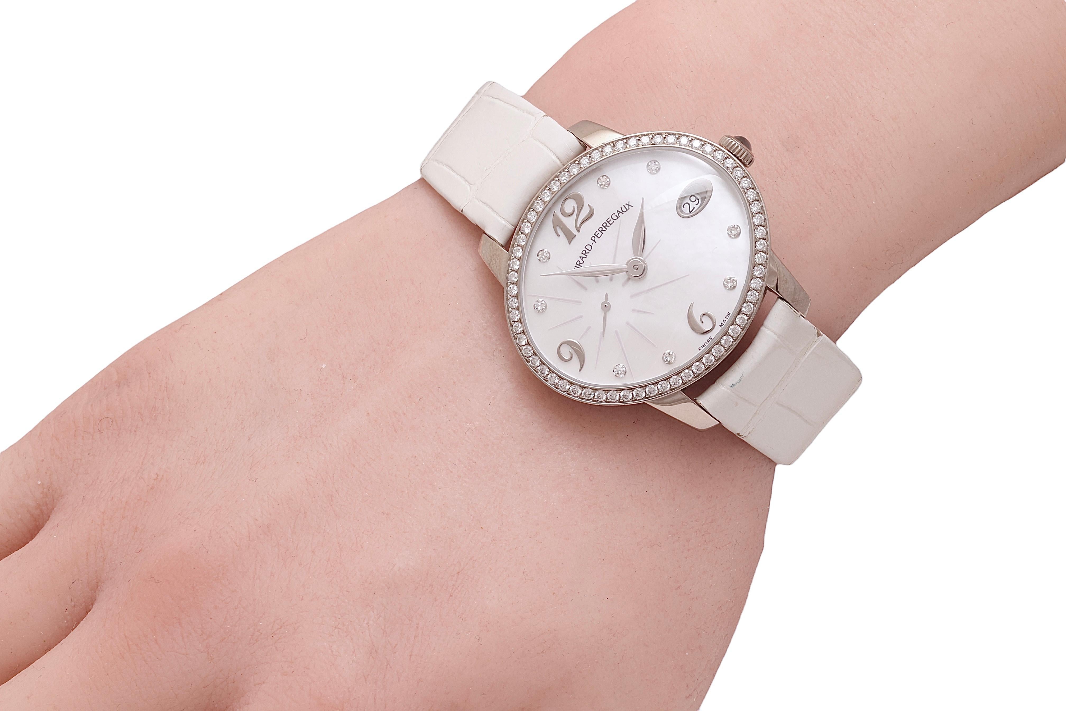 Girard Perregaux Montre oeil de chat automatique en or blanc 18 carats et diamants en vente 2