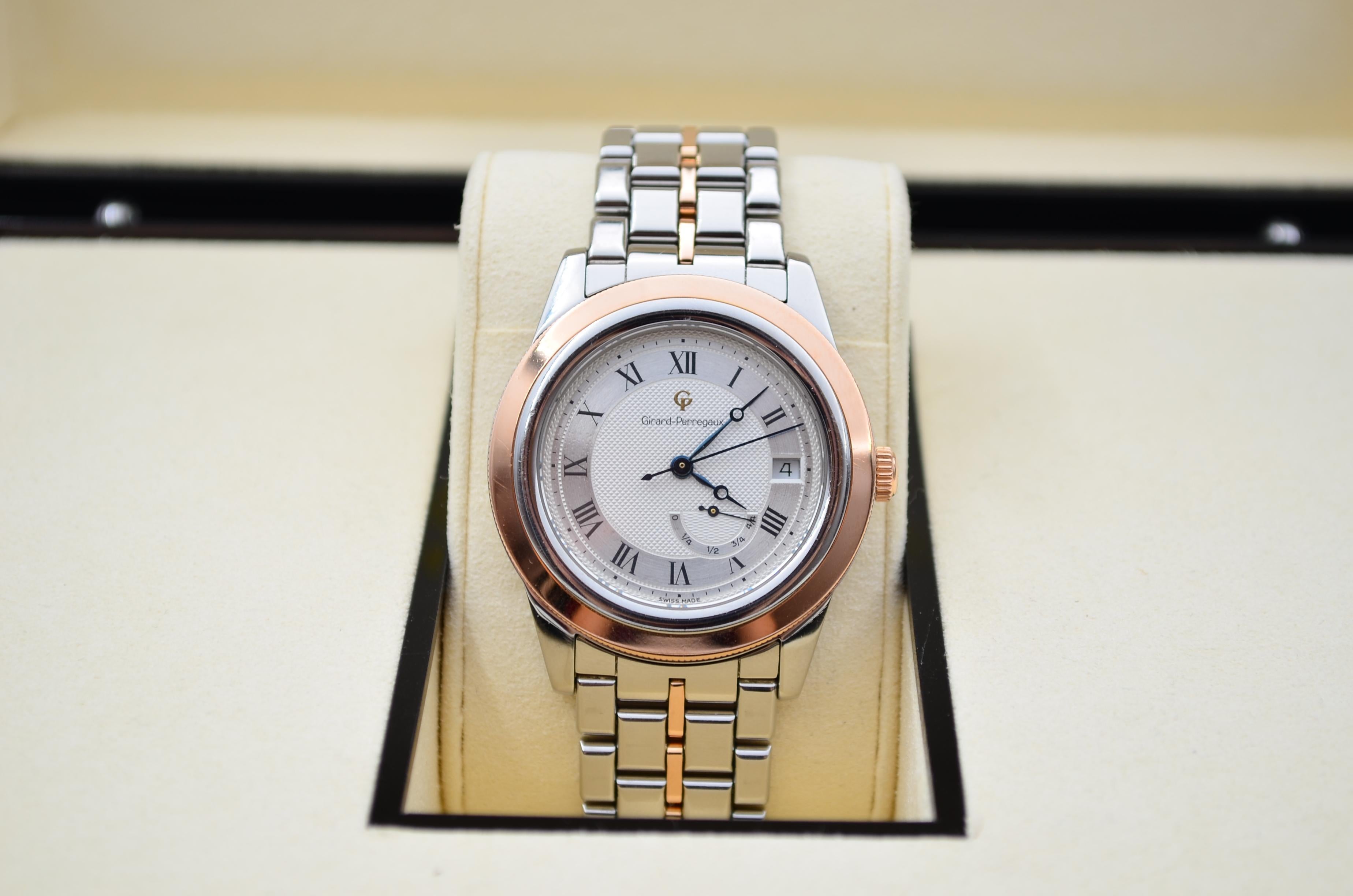 The watch is in a very good condition and it’s working well. It shows slight signs of wear and scratches. The watch comes with an AGS Jewelry wooden box, along with an AGS Jewelry warranty card.  Girard-Perregaux is a prestigious Swiss watchmaking