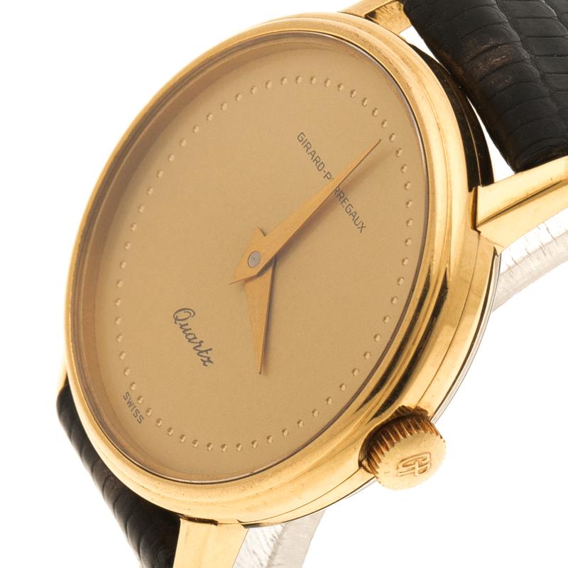Your dream to own a beautiful vintage creation comes true in this timepiece from Girard Perregaux! The watch has been beautifully made from gold-plated metal and held by leather straps. It has a round case with a smooth bezel, and a dial bearing two