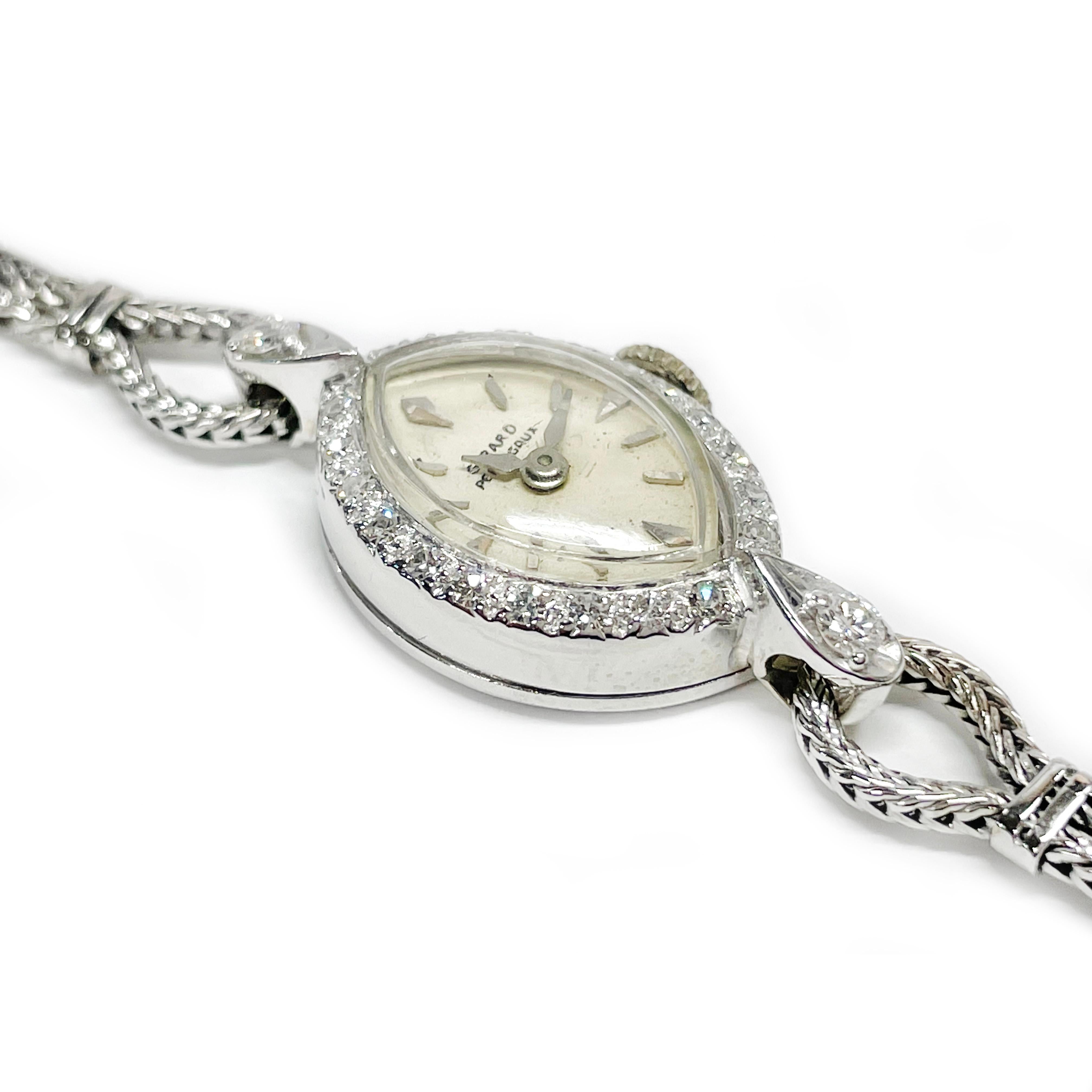 Girard Perregaux Damenuhr mit Diamantarmband, ca. 1930er Jahre. Das marquisefarbene Zifferblatt ist mit runden, perlenbesetzten Diamanten im Einzelschliff eingefasst und mit silbernen Stunden- und Minutenzeigern versehen. Die Uhr verfügt über