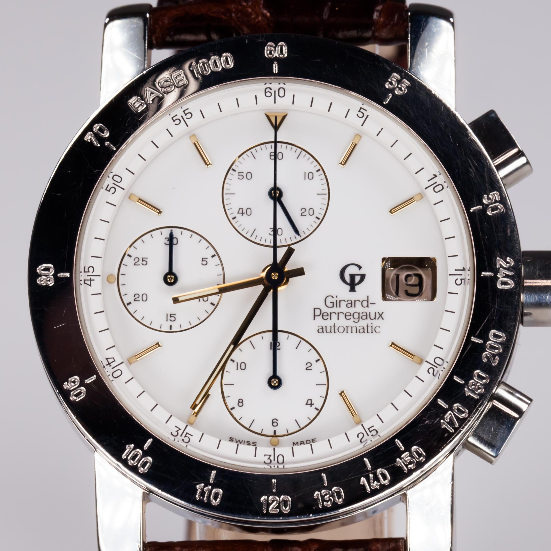 Girard Perregaux Men's Stainless Steel Automatic Chronograph Watch GP7000

Model #GP7000
Serial #A6038
Movement #GP800114

Stainless Steel Case w/ Tachymeter Bezel
38 mm in Diameter (41 mm w/ Crown)
Lug-to-Lug Width = 20 mm
Lug-to-Lug Distance = 46