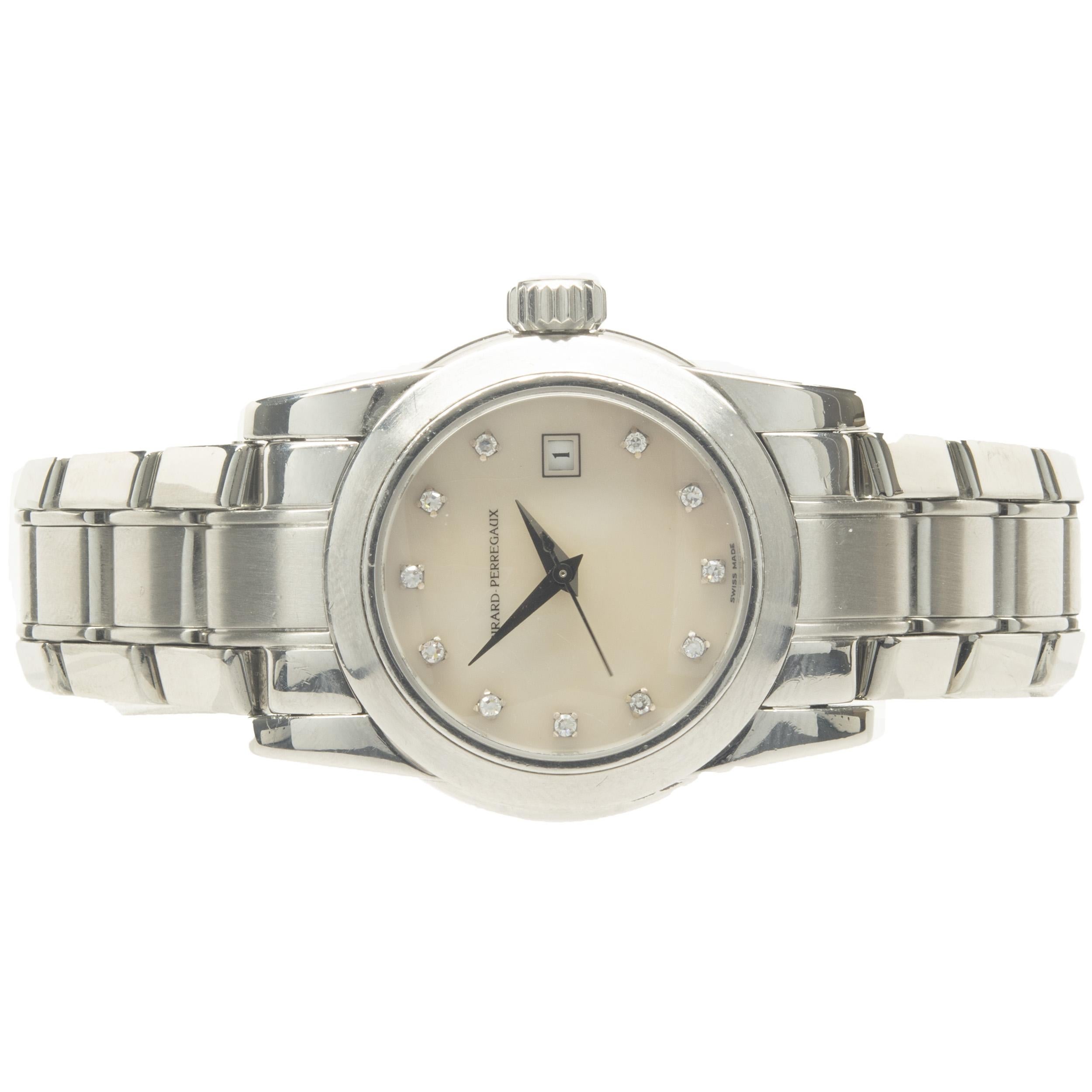 Movement: automatic
Function: hours, minutes, seconds, date
Case: round 29mm stainless steel case with sapphire crystal
Band: stainless steel bracelet, integrated clasp
Dial: mother of pearl, diamond
Serial #: AN1XXX
Reference #: 8039
	
No box or