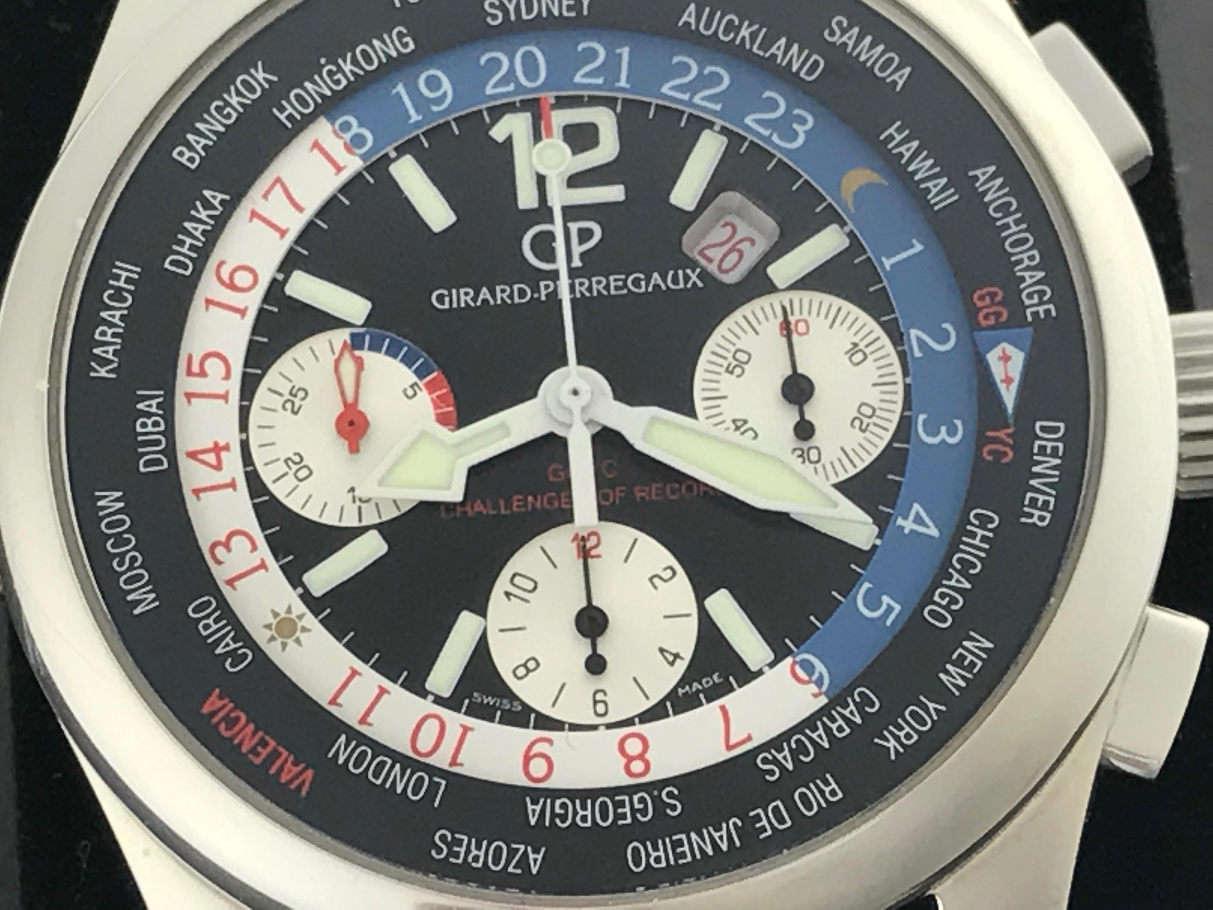 Girard Perregaux World Time Model 49800.11.657-F Pre Owned Mens Chronograph; Limited Series of 750 Pieces for BMW Oracle Challenger Record for 32nd America's Cup 2007.  Automatic Winding with Date. Black Dial with white markers with cities of the