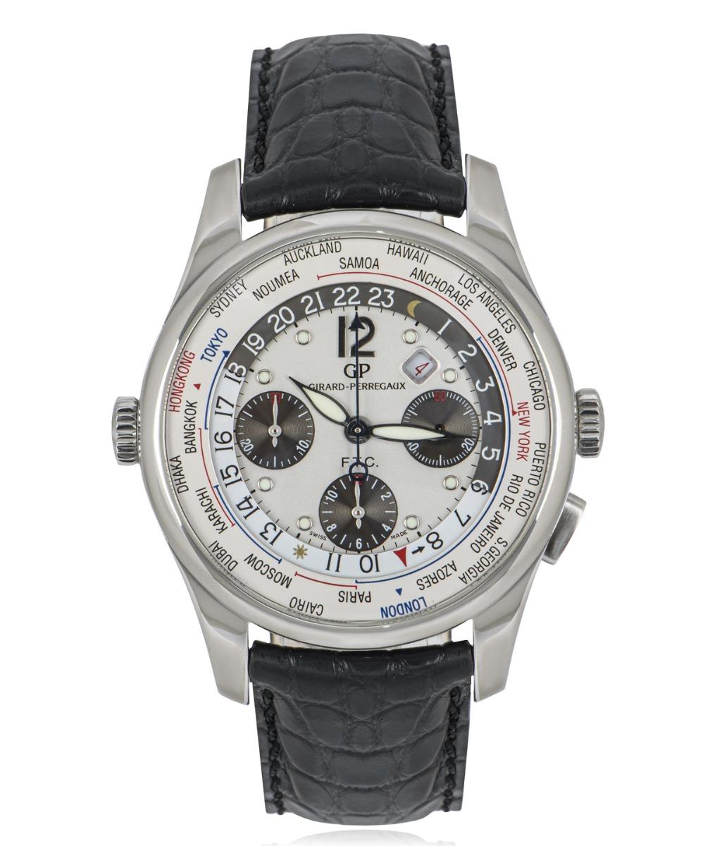 A discontinued mens 43mm stainless steel World Timer WW TC by Girard Perregaux. Features a silver dial with arabic applied number 12, a date aperture, 3 sub dials with a 30 minute, 12 hour and 60 seconds. Featuring an inner rotating bezel indicating