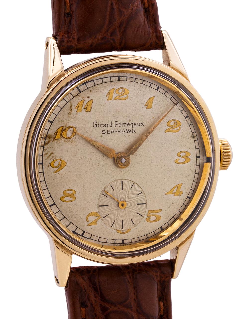 
Vintage Girard Perregaux Sea Hawk 14K gold top with stainless steel case back circa 1940's. Featuring a 33mm diameter case with acrylic crystal and very pleasing original antique white dial with applied gold Breguet style figures and gilt leaf