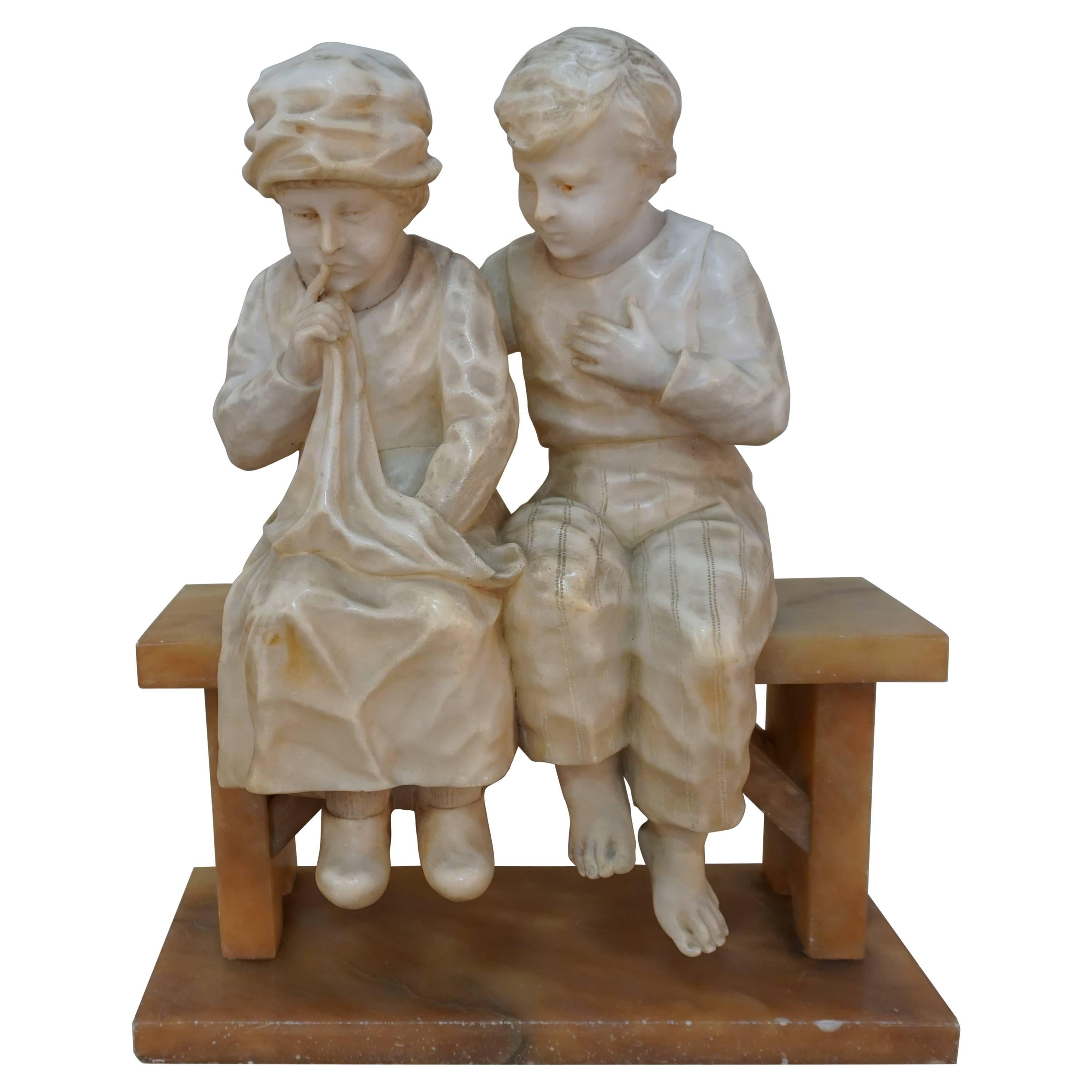 Girl and Boy Sitting on Bench Marble Sculpture