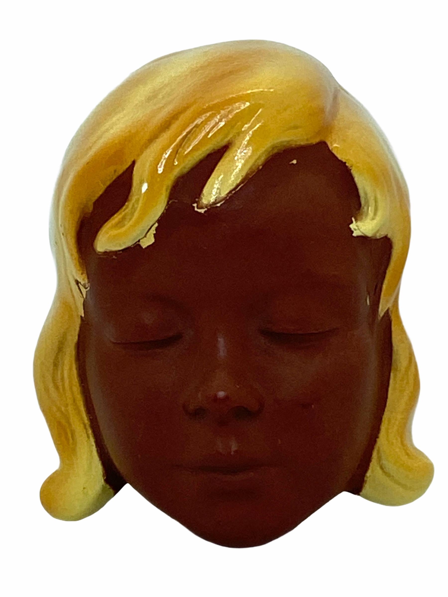 A beautiful vintage earthenware wall mask of a girl. It is marked with number at the backside. It would make a beautiful Decoration on each wall. Made in the 1950s it displays the joy of that great era with a bold, yet classy statement.