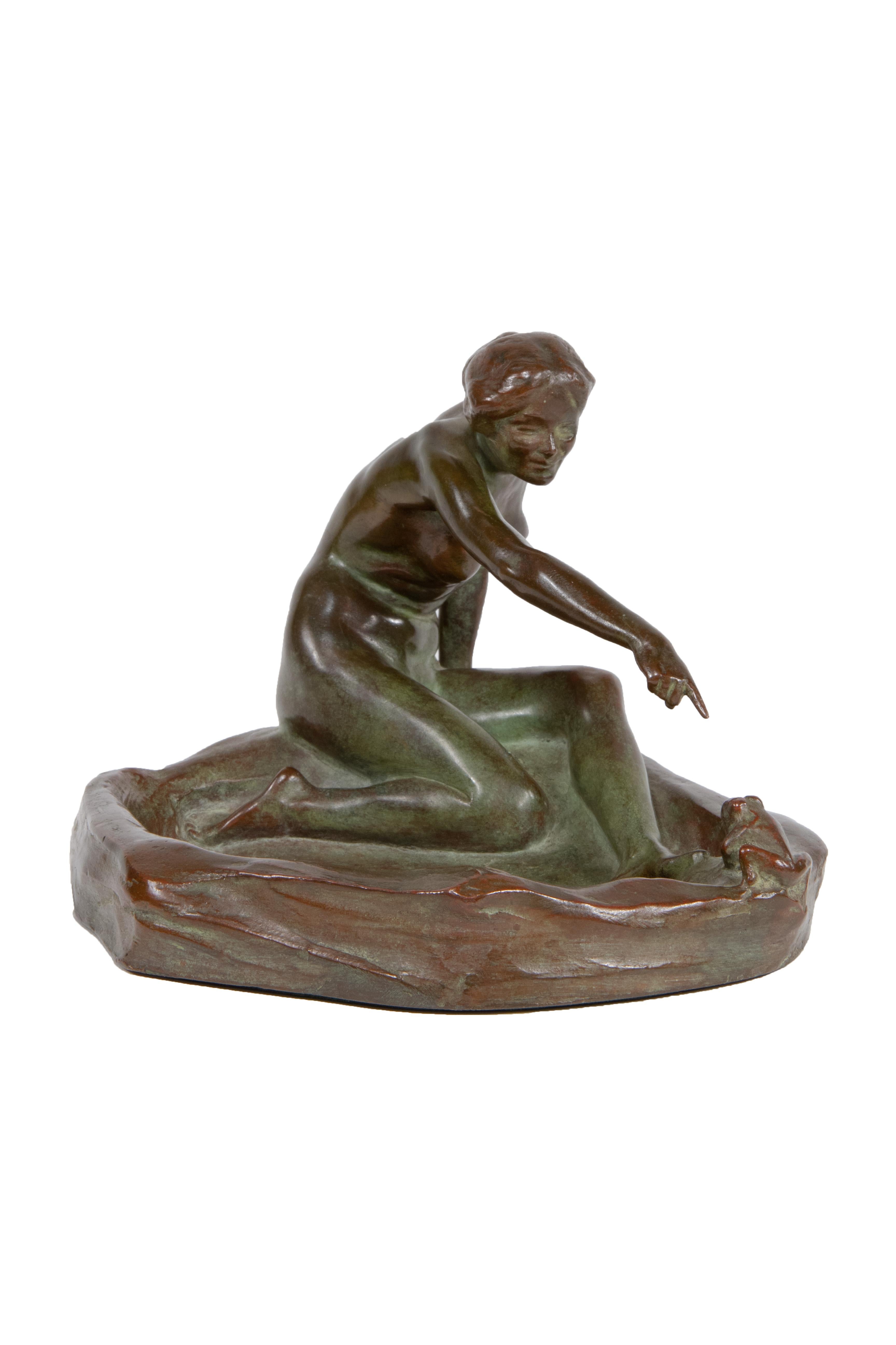 An American Art Nouveau patinated bronze vide de poche titled 