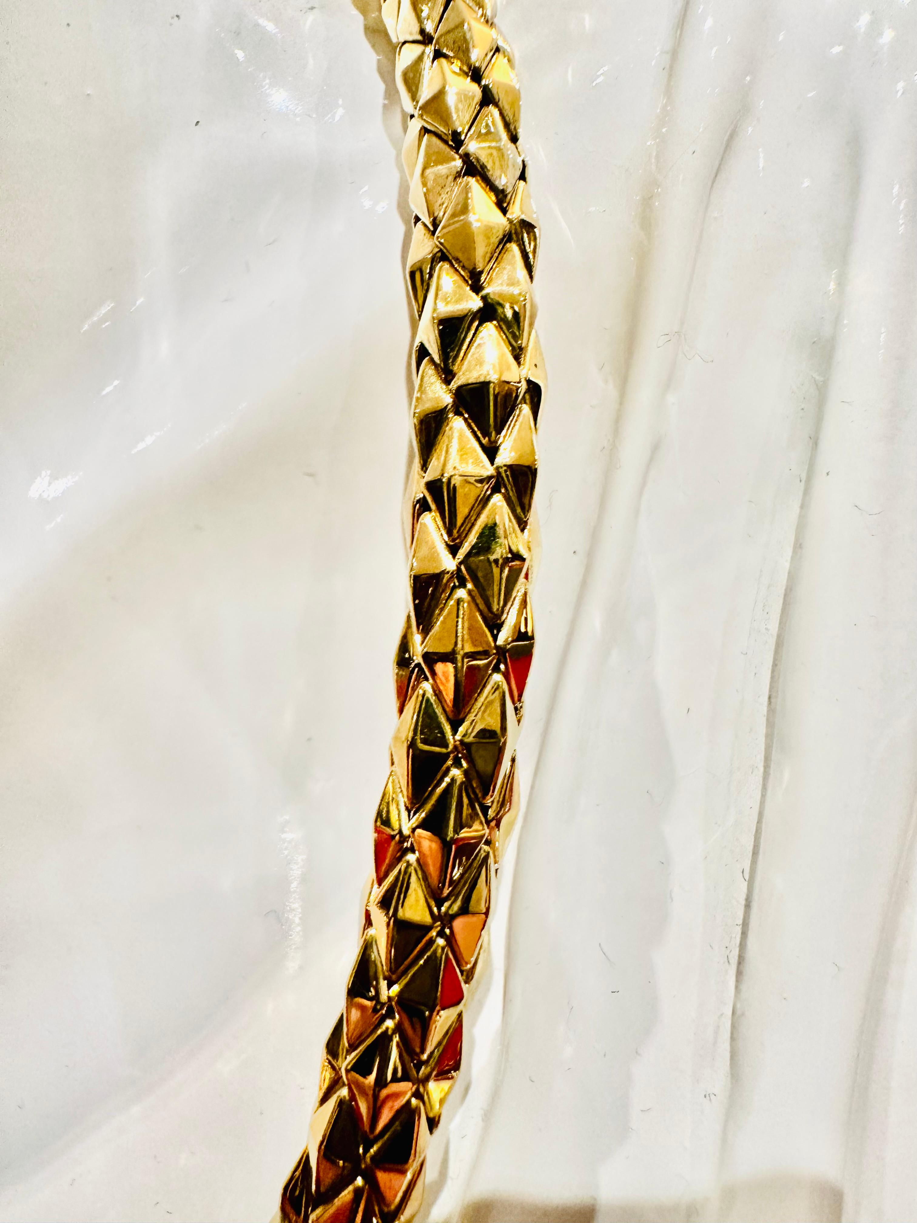 Chimento 18K yellow gold choker necklace: A masterpiece of Italian design and craftsmanship, this signature Chimento choker necklace expresses luxury and exclusivity in every detail. Made with braided workmanship and a three-dimensional effect, the