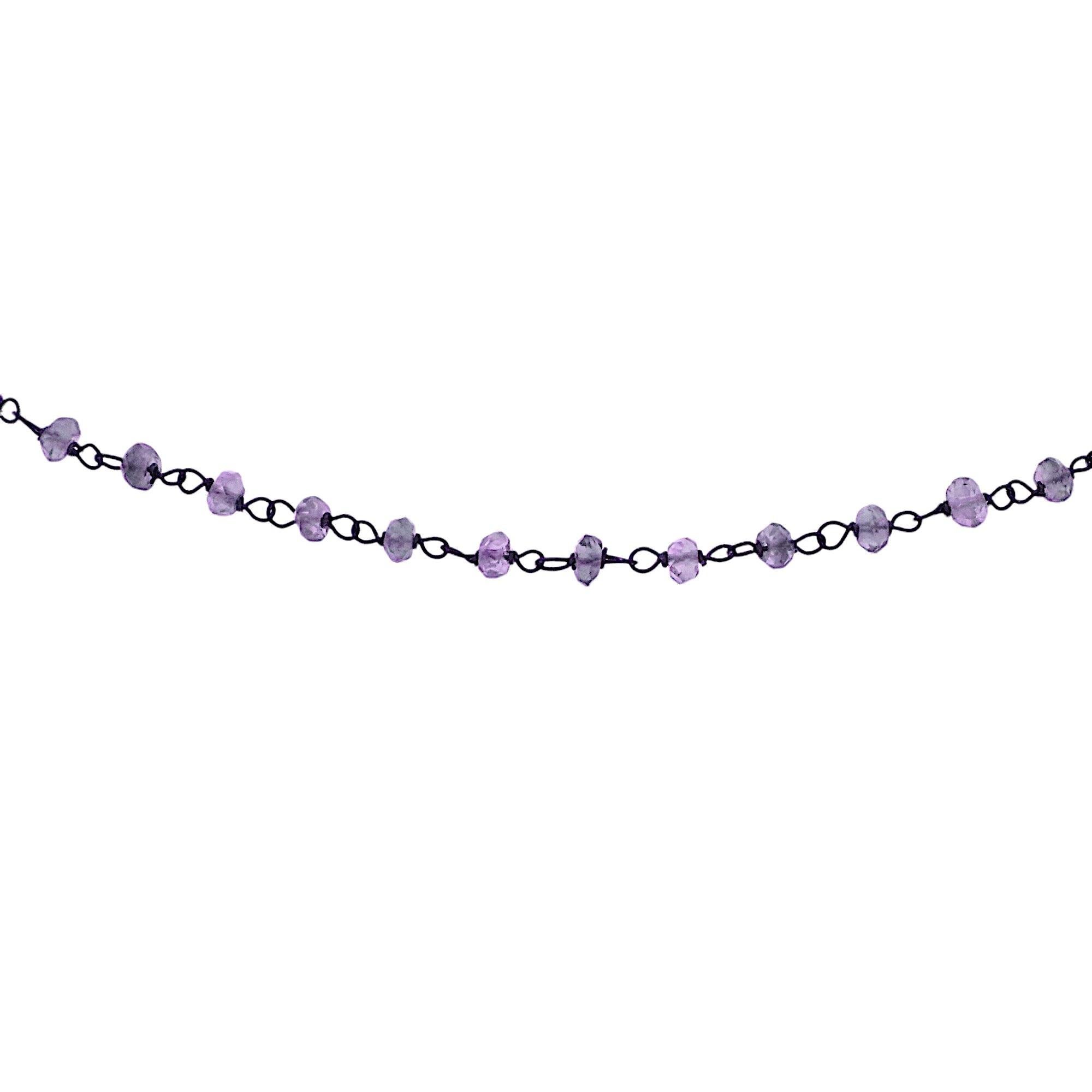 Necklace formed of small 3 mm / 0.118 inches iolite nuggets threaded into 18k white gold with black rhodium. The choker was handcrafted by Botta Gioielli in Milan, has the 750 mark of 18k gold and the 716MI mark of Botta Gioielli. The total length