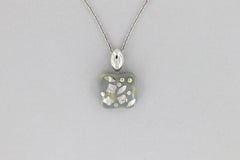 La Nouvelle Bague necklace in gold, enamel and diamonds.