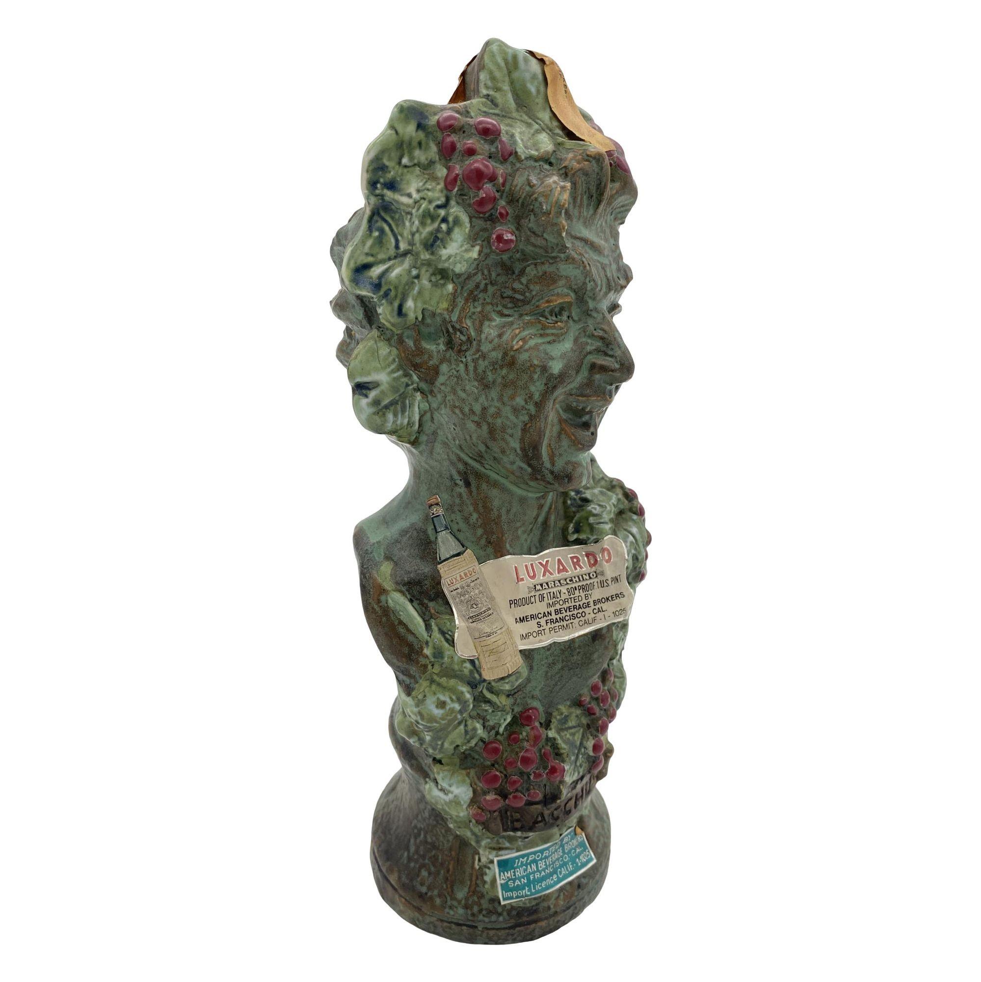 Girolamo Luxardo ardo cherry wine Bacchus bust decanter - Italy - Sealed never opened bottle. The colors are bright and vivid and this piece displays well.