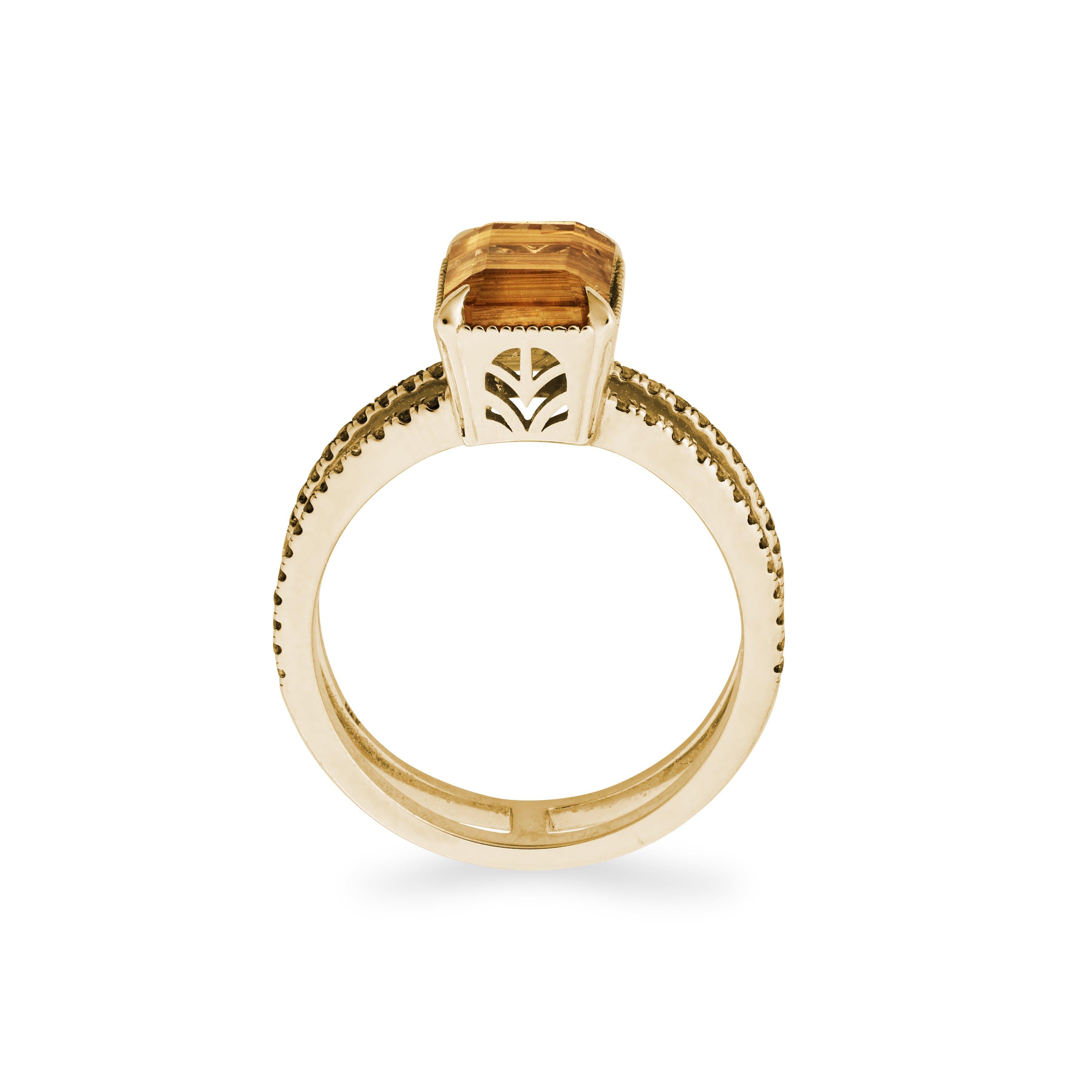 One of A Kind

This golden beauty features double bands covered in champagne diamonds that perfectly accent the fair trade Brazilian rutilated quartz center stone. A unique engagement ring option, or the perfect cocktail ring, the inclusions of the