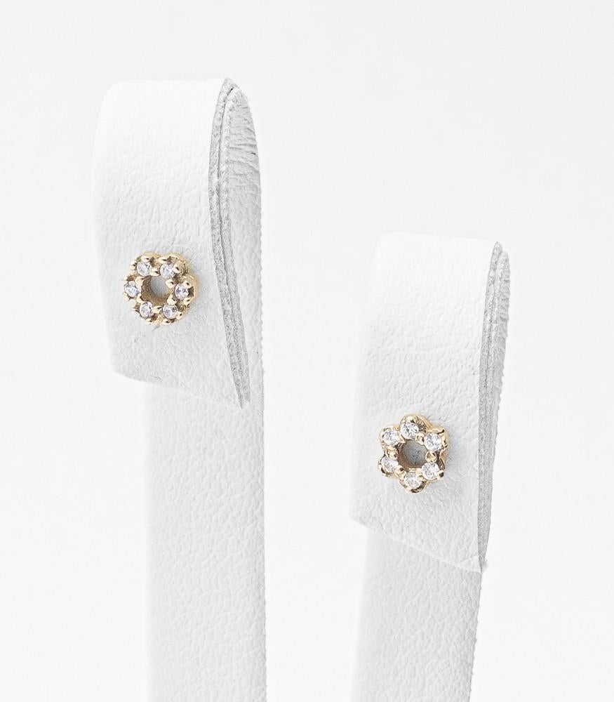 Giselle Collection Estasi 18kt Yellow Gold Stud Earrings with Diamonds

Amazing small lobe earrings in 18kt yellow gold with a unique and refined design, inspired by the delicacy of the flowers.

The design of this collection is inspired by the