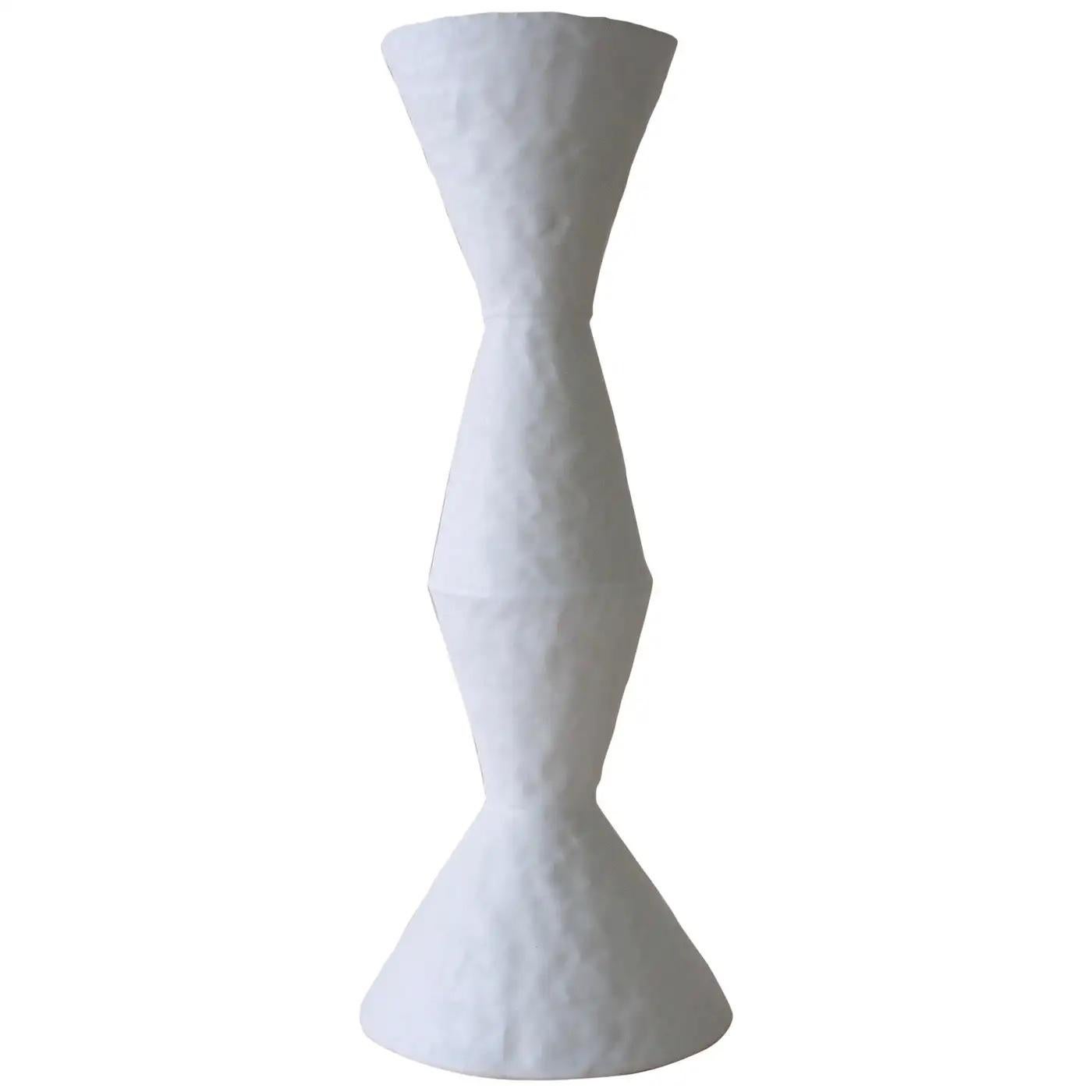 Contemporary American ceramic artist Giselle Hicks' glazed white stoneware vase is part of her Vessel Series. Each form is built by hand using a coil and pinch technique. They are formal explorations in shape, volume, color and composition. The