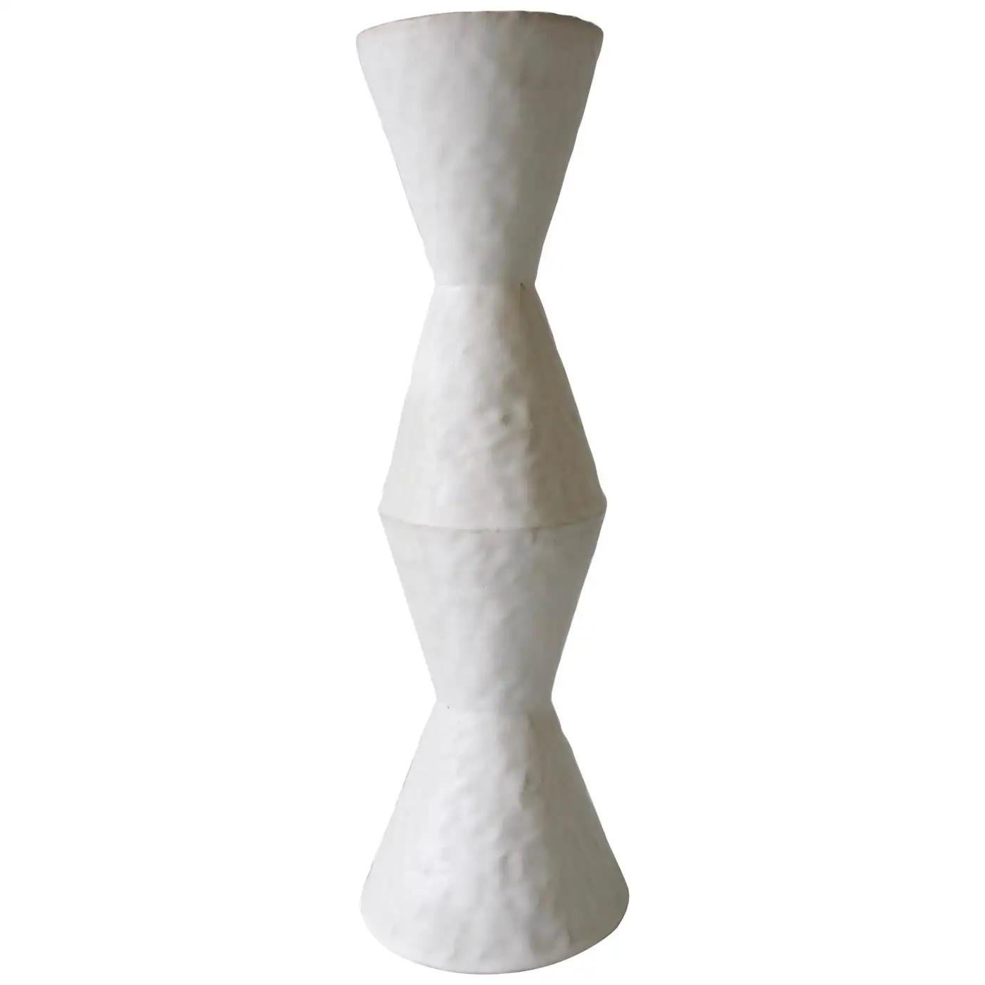 Contemporary American ceramic artist Giselle Hicks' glazed white stoneware vase is part of her Vessel Series. Each form is built by hand using a coil and pinch technique. They are formal explorations in shape, volume, color and composition. The
