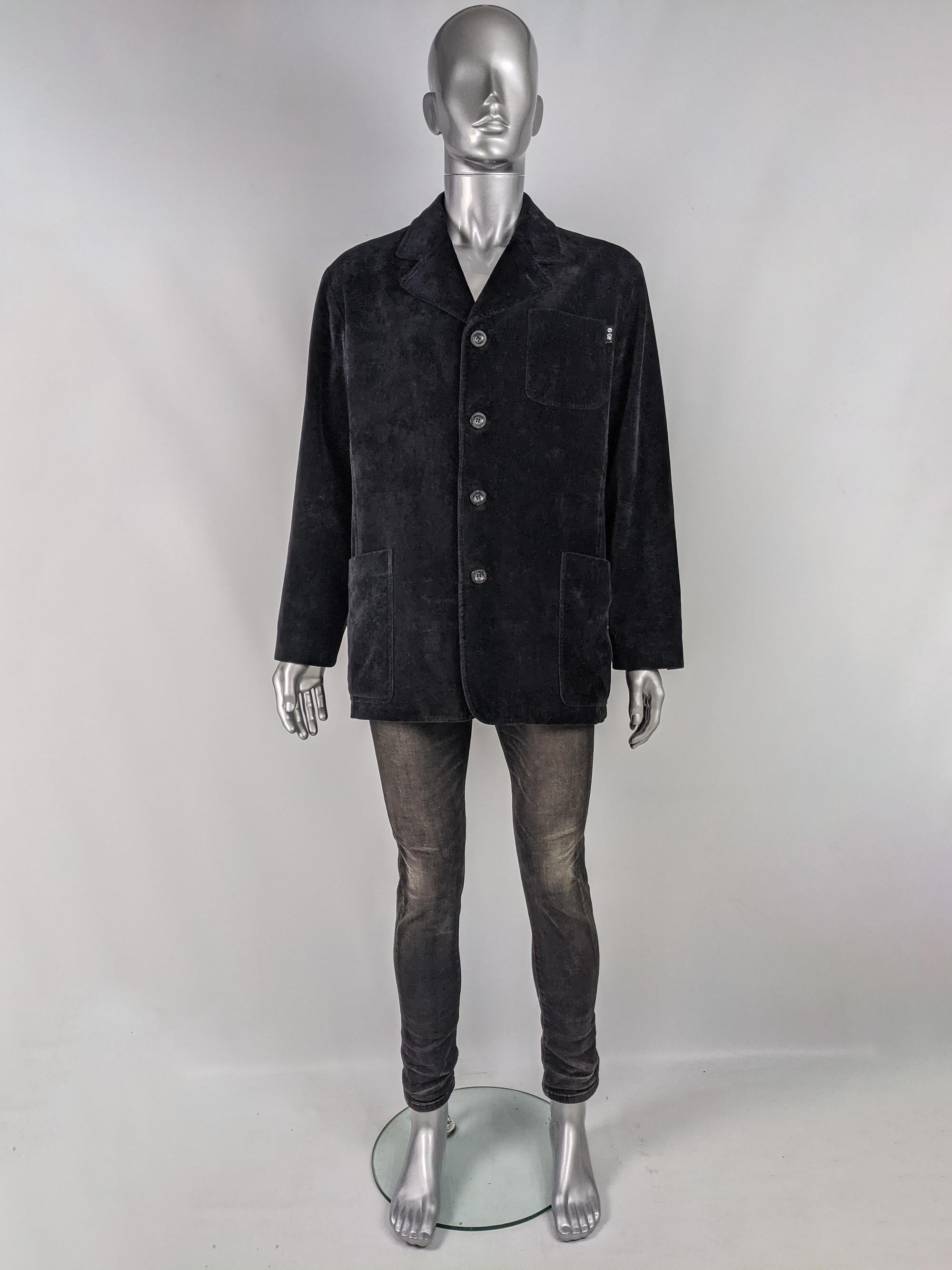 A stylish vintage mens black velvet Gianfranco Ferré jacket from the 90s. In a black velvet with four single breasted buttons for a classic look.

Size: Marked IT 50 which equates to a mens Large. Please check measurements. 
Chest - 44” / 112cm