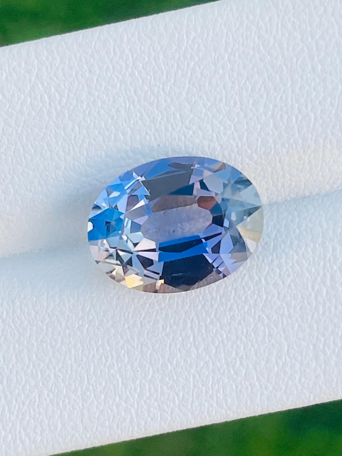 Women's or Men's 6.96 Ct GIT AIG Two certificate Natural Unheated Tanzanite Metallic purple Color For Sale