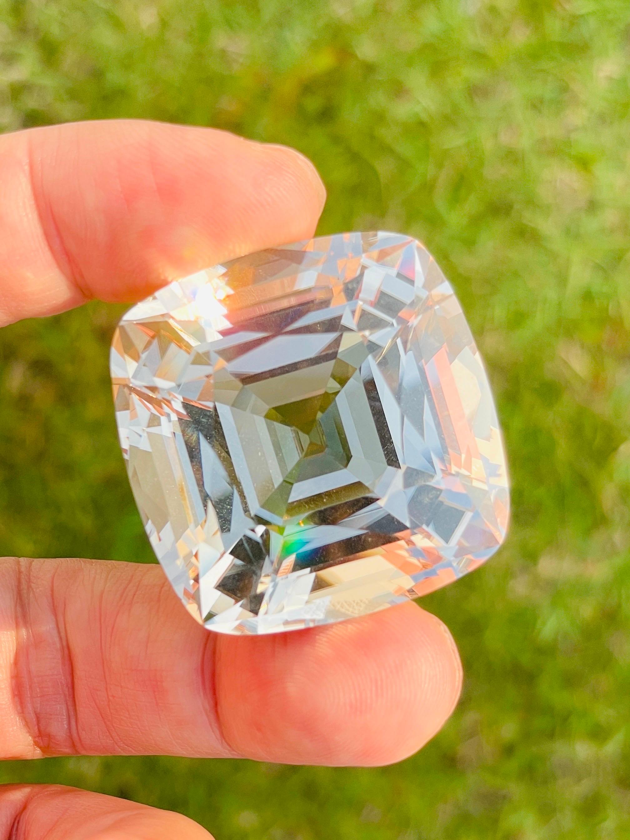 Name: untreated natural topaz 
weight: 221.4ct
size:  33.5*34.7*22.5mm
origin: Brazil 
color: light champagne
clarity: eye clean 
certificate: GIT ( Thailand national certification)
Cutting: Germany cut 
Designer & cut : by WB Gem 
Treatment : No
