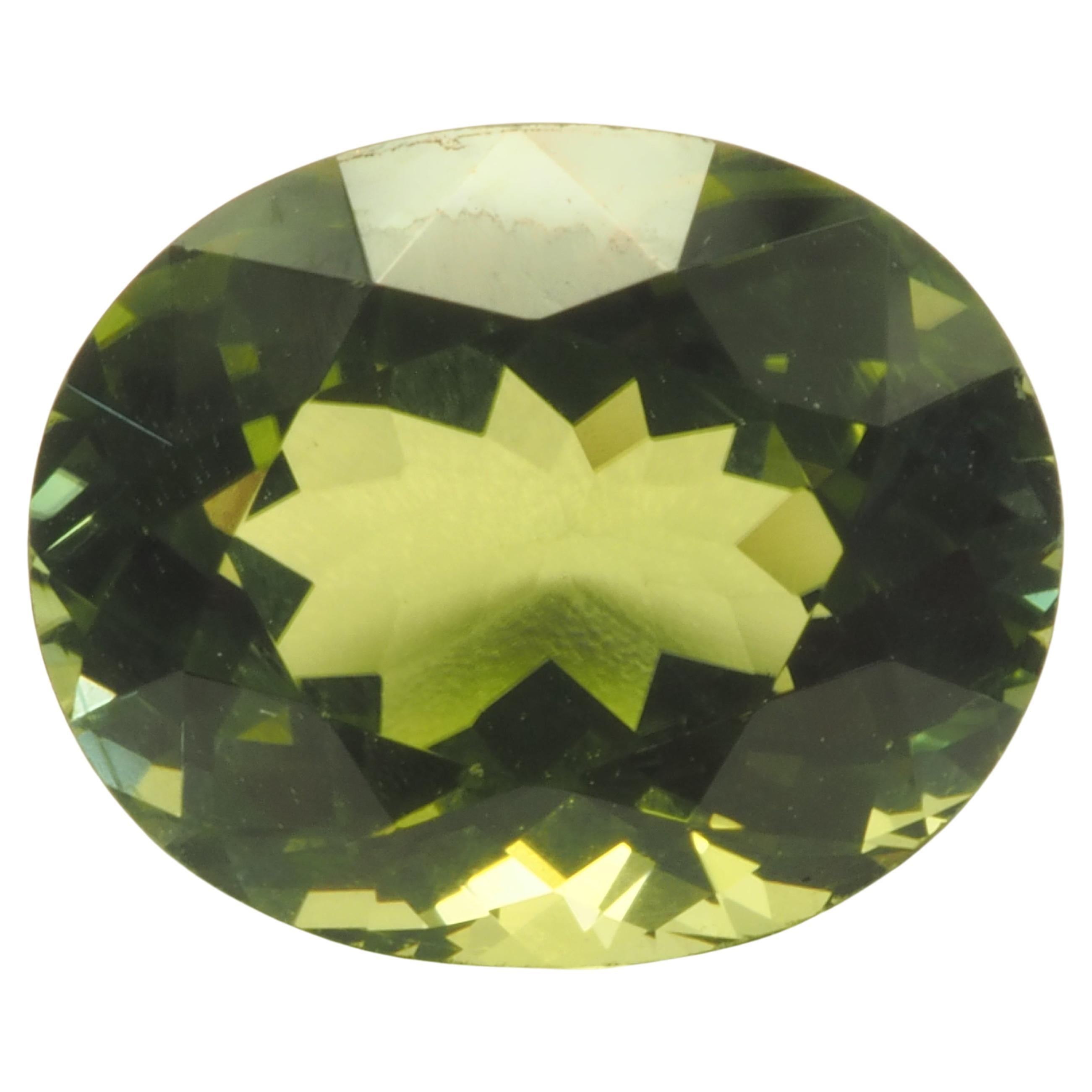 GIT Certified 4.37ct Oval Olive Green Tourmaline, Eye Clean, 11.13x9.12x6.59 mm For Sale