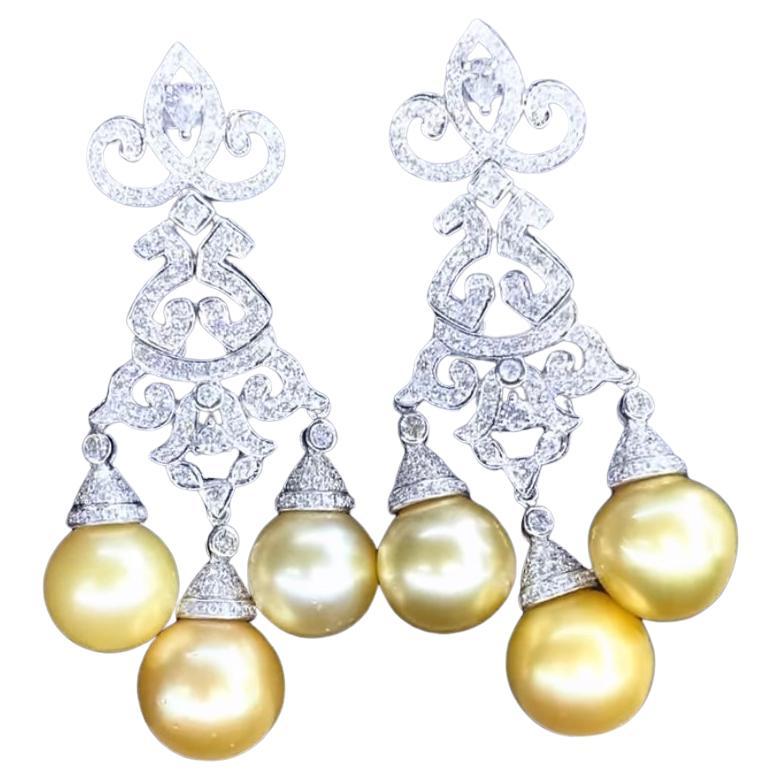 An exquisite Golden South Sea Pearls and Diamonds pair of earrings.
The pearls are the epitome of elegance and sophistication, perfect for any formal occasion or as a timeless addition to your jewelry collection.
The lustrous pearls are carefully