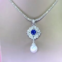 Pendentif perle des mers du Sud certifiée GIT, saphir de Ceylan 3,60 carats et diamants 3,40 carats