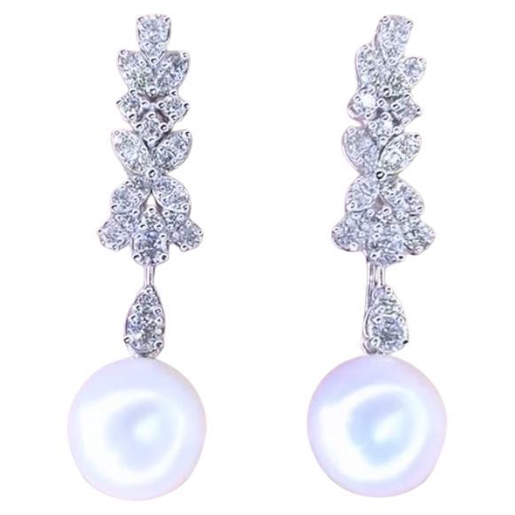 Orecchini in oro 18 carati con perle dei mari del sud certificate GIT e 1,50 carati di diamanti