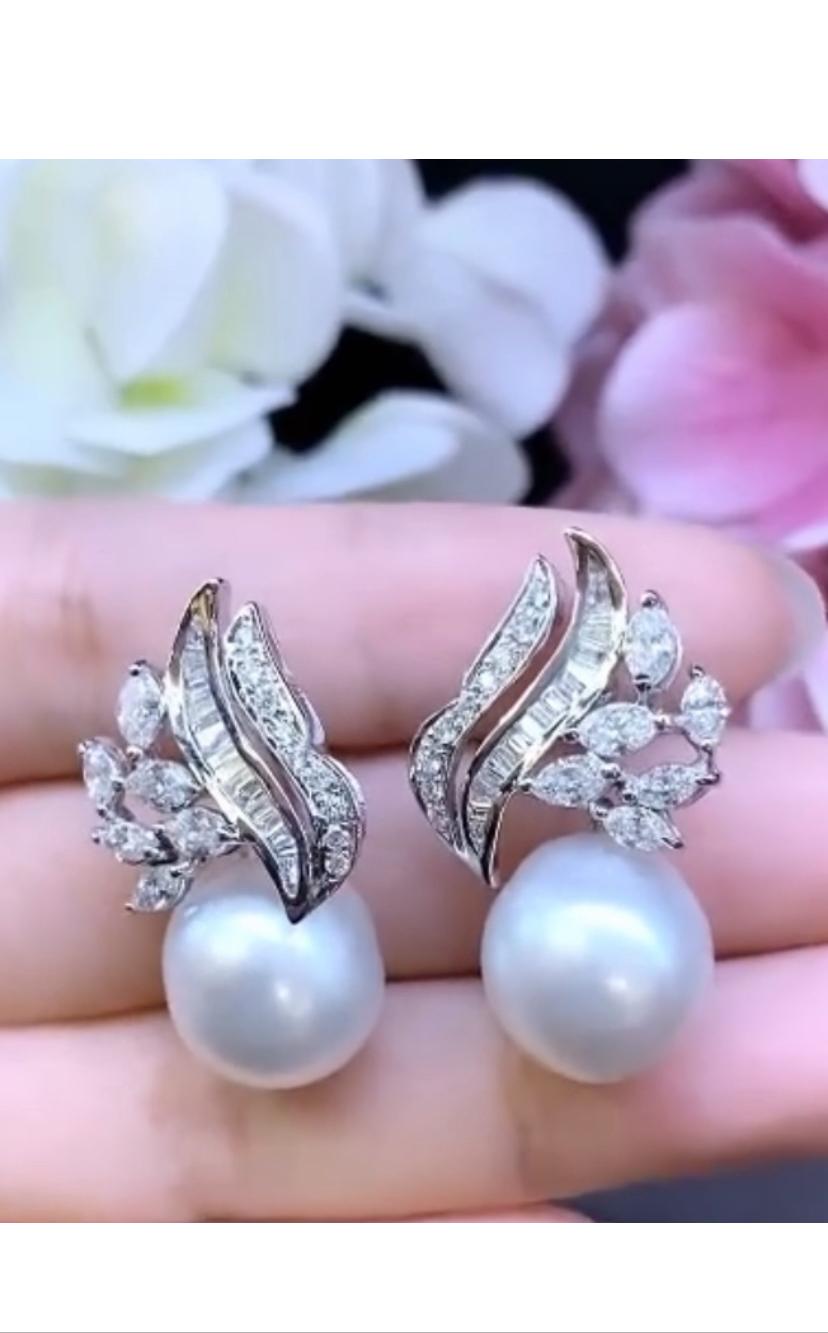 Magnificent pair of earrings with high quality of  South Sea Pearls and diamonds , the perfect match for any occasion.
Our earrings are adorned with sparkling diamonds , adding a touch of glamour and sophistication to this already stunning piece &