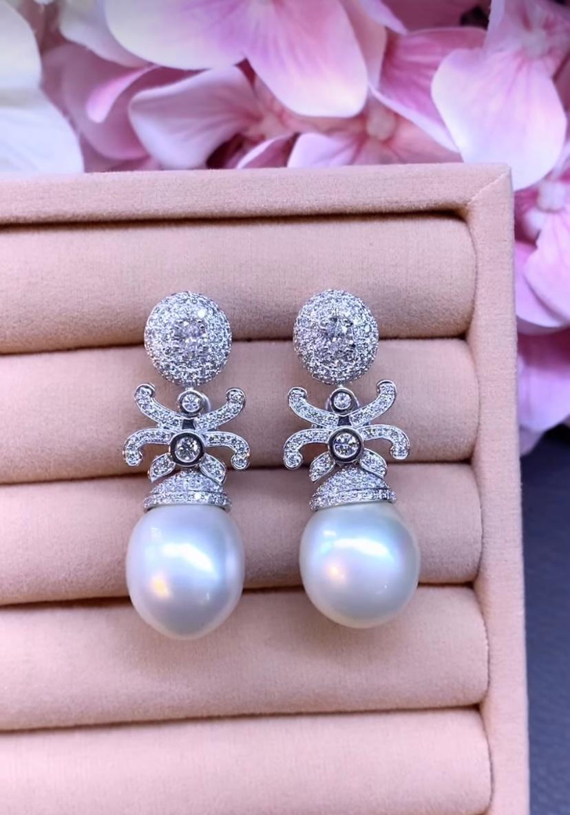 An exclusive South Sea Pearls and Diamonds earrings.
Adorn yourself with the epitome of elegance - white South Sea Pearls earrings. Its luminous luster and radiant shine beautifully reflect sophistication and grace.
Each pearl, a testament to