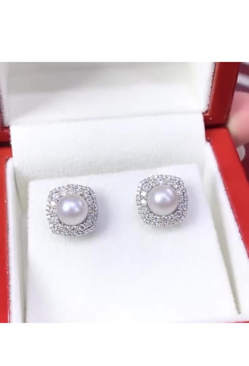 An exclusive lustrous South Sea Pearls and Diamonds earrings.
Adorn yourself with the epitome of elegance-white South Sea Pearls earrings. Its luminous luster and radiant shine beautifully reflect sophistication and grace.
Stunning earrings come in