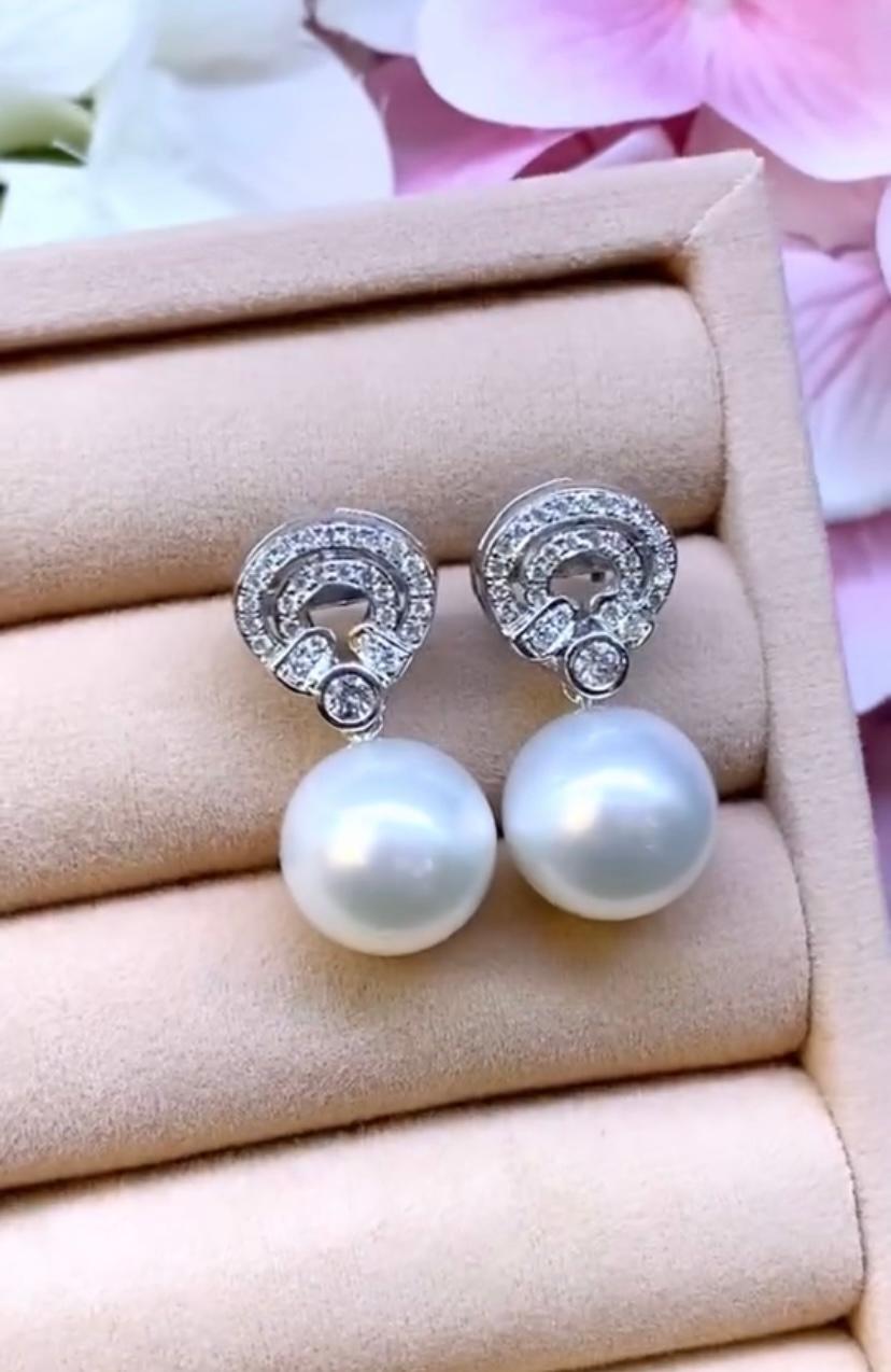 An exclusive South Sea Pearls and Diamonds pair of earrings.The perfect combination of elegance and sophistication, these earrings are designed to captivate.
Elevate any ensemble with these stunning accessories, guaranteed to make a statement