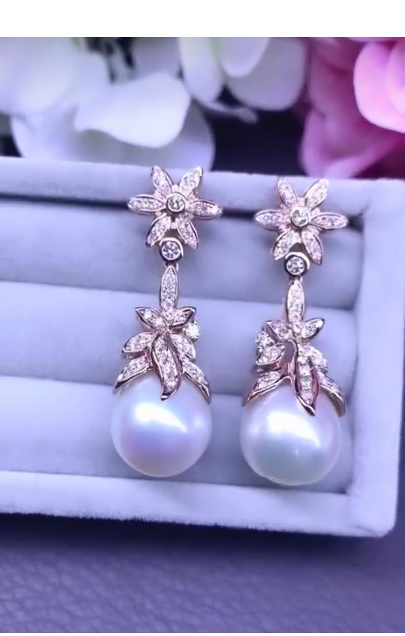 An exquisite South Sea Pearls and Diamonds earrings, in adorable floral design, so original and particular.
Pearls exude elegance and charm, their  timeless captivating the beholder.
South Sea Pearls earrings, adorned with dazzling diamonds,
