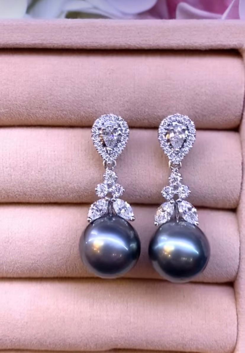 Donna Orecchini in oro 18K con perle di Tahiti e diamanti certificati GIT