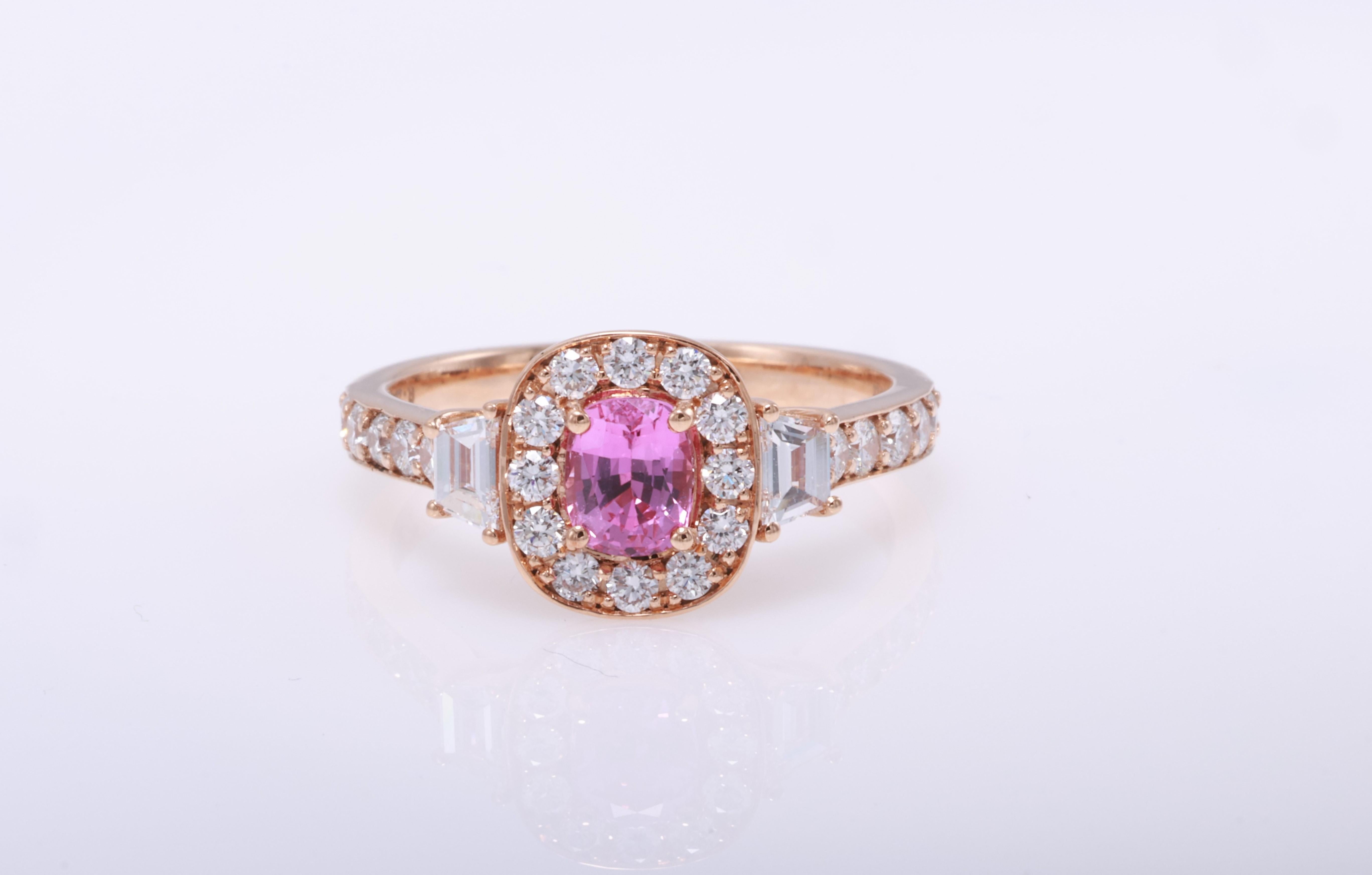 18kt white gold sapphire ring with diamonds
  
  Gold colour & karat: White gold 18kt
  Weight: 2.937 grams
  
  Set with-
  Stone type: Sapphire
  Shape: Cushion
  Carat: 0.64
  Colour: Pink
  Clarity: -
  
  Surrounding Stones: Diamonds
 1) Side