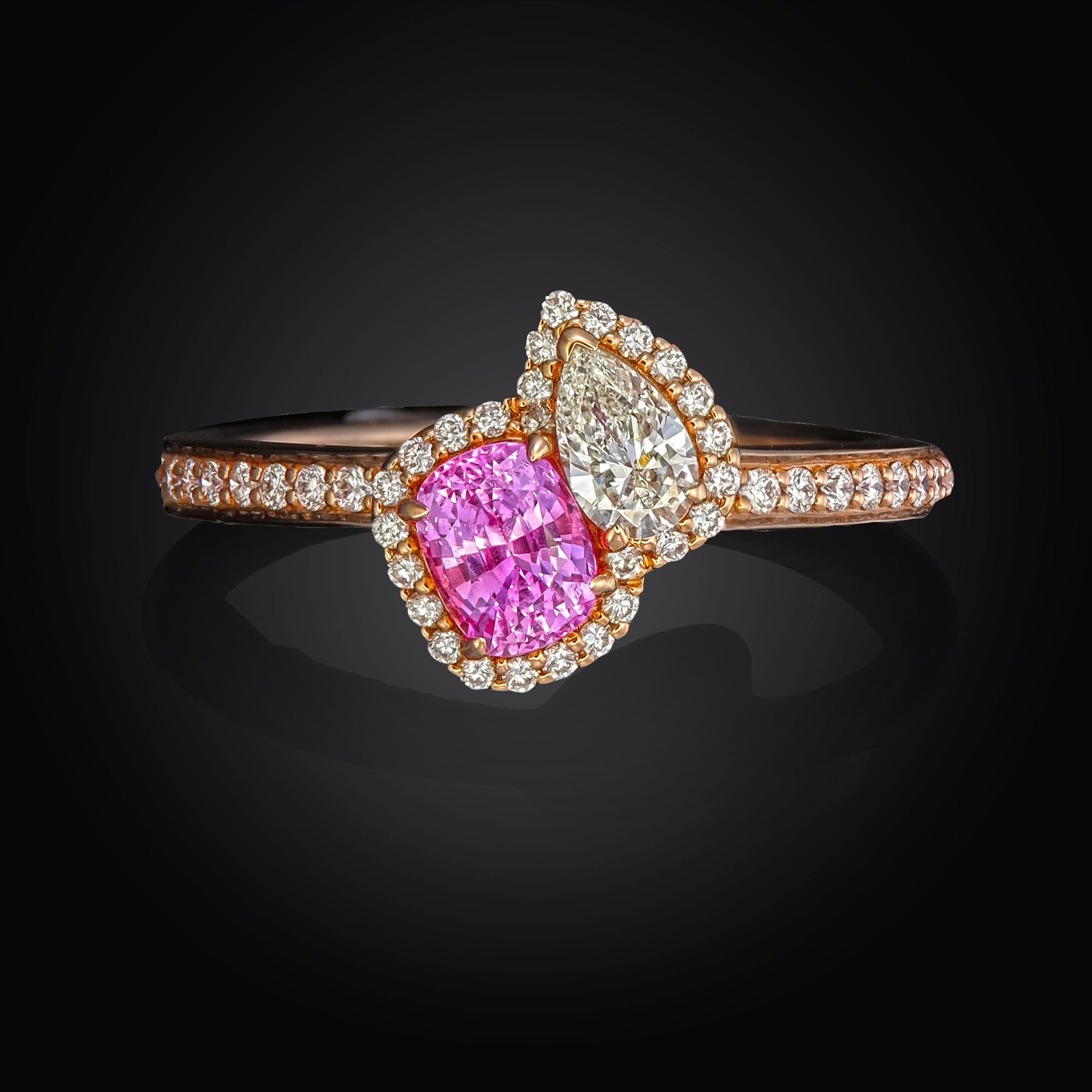 18kt white gold ruby ring with diamonds
  
  Gold colour & karat: White gold 18kt
  Weight: 2.955 grams
  
  Set with-
  Stone type: Sapphire
  Shape: Cushion
  Carat: 0.53 
  Colour: Pink
  Clarity: -
  
  Surrounding Stones: Diamonds
 1) Side Pear