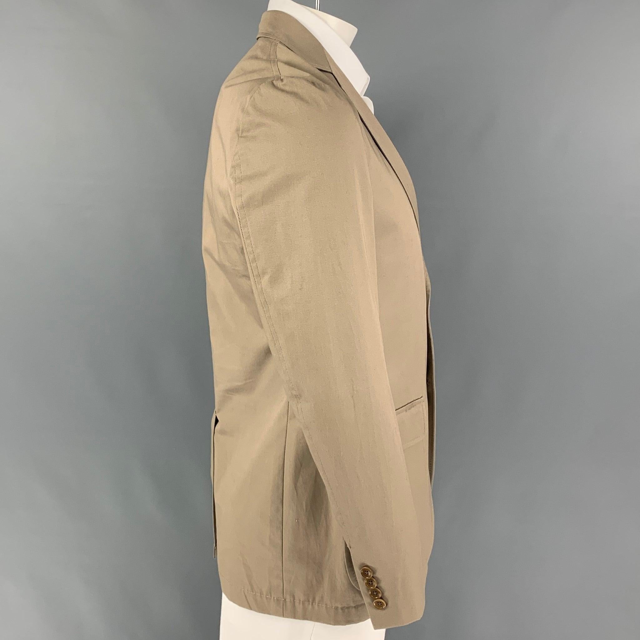 GITMAN BROS for UNIONMADE sport coat comes in a khaki cotton with a half liner featuring a notch lapel, flap pockets, single back vent, and a three button closure.
Very Good
Pre-Owned Condition. 

Marked:   40 

Measurements: 
 
Shoulder: 18 inches