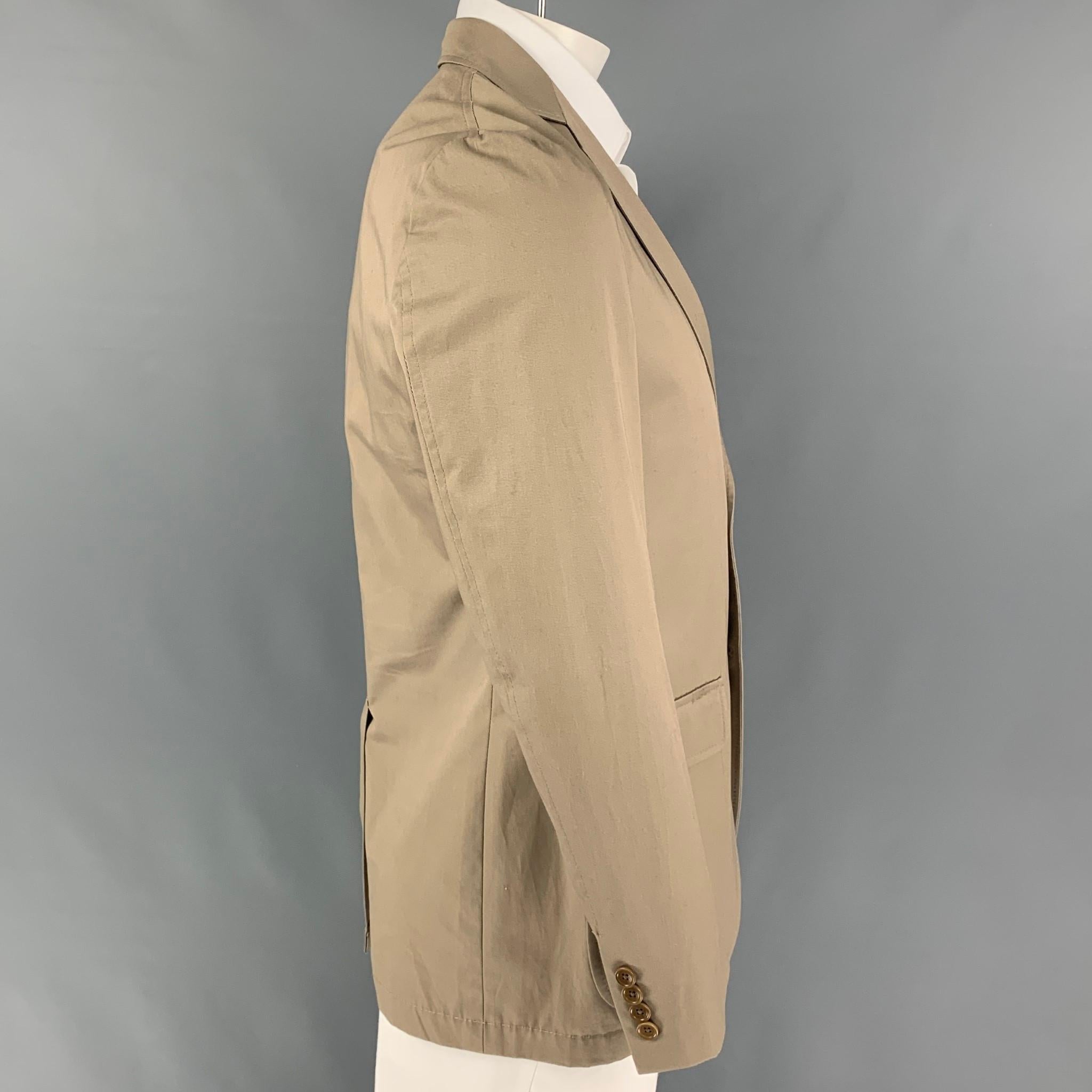 GITMAN BROS for UNIONMADE sport coat comes in a khaki cotton with a half liner featuring a notch lapel, flap pockets, single back vent, and a three button closure. 

Very Good Pre-Owned Condition.
Marked: 40

Measurements:

Shoulder: 18 in.
Chest: