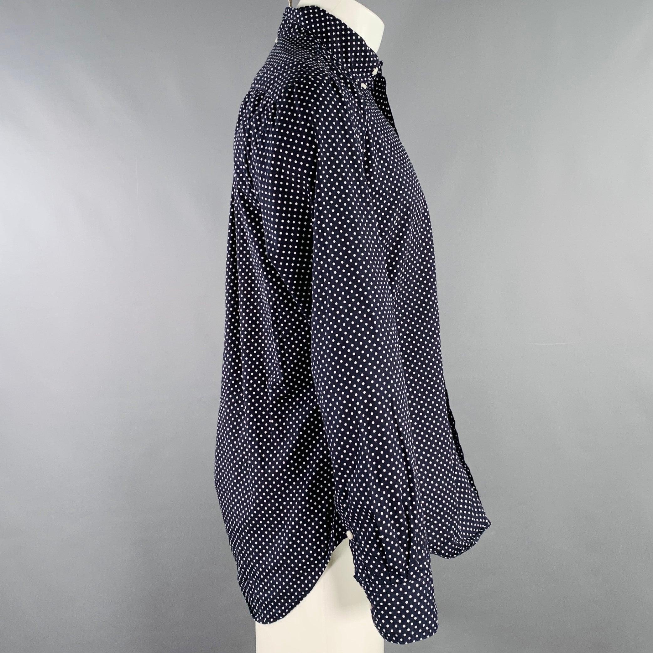 GITMAN BROS long sleeve shirt
in a black and white cotton woven fabric featuring a polka dot pattern, one pocket, and button closure. Made in USA.Excellent Pre-Owned Condition. 

Marked:   M 

Measurements: 
 
Shoulder: 16.5 inches Chest: 42 inches
