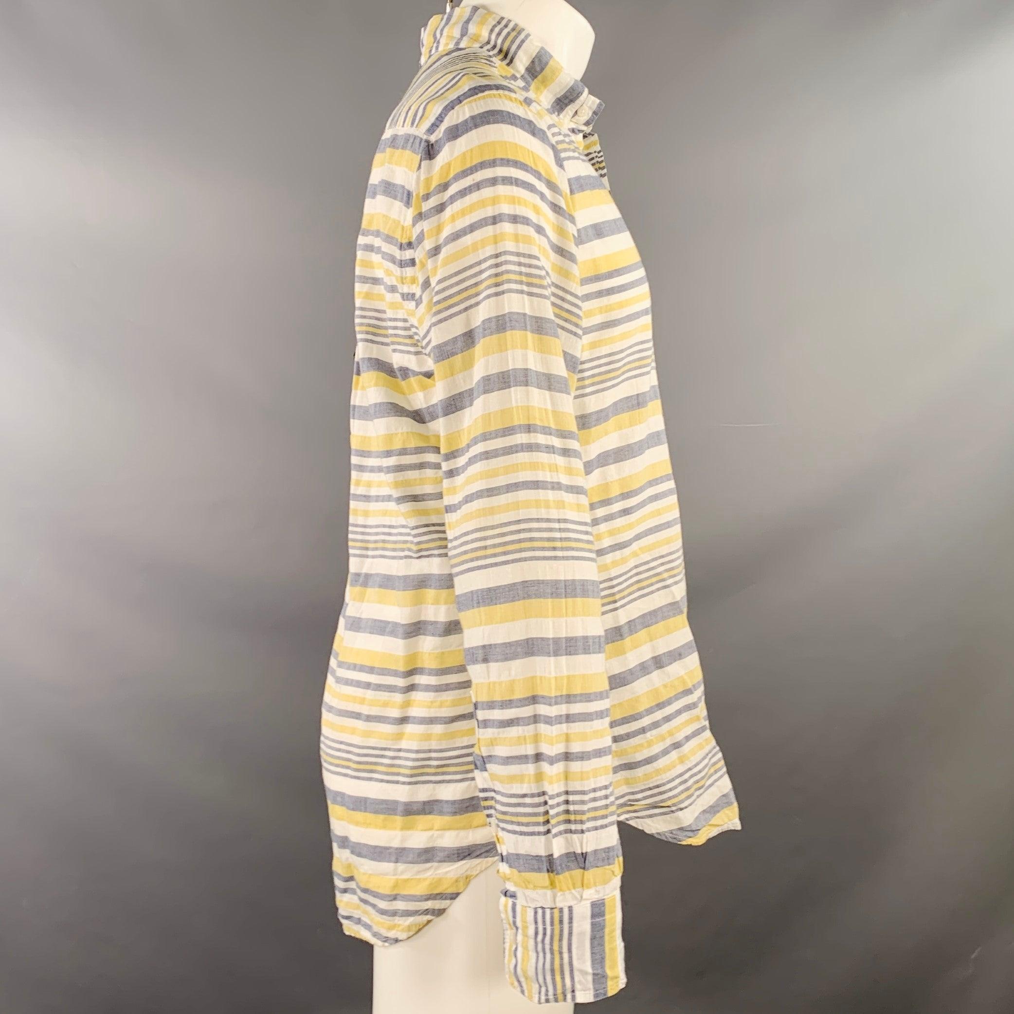 GITMAN BROS VINTAGE long sleeve shirt
in a white, grey, and yellow cotton blend fabric featuring a button down collar, plaid pattern, one pocket, and button closure. Made in USA.Good Pre-Owned Condition. Multiple minor marks, minor pilling.
