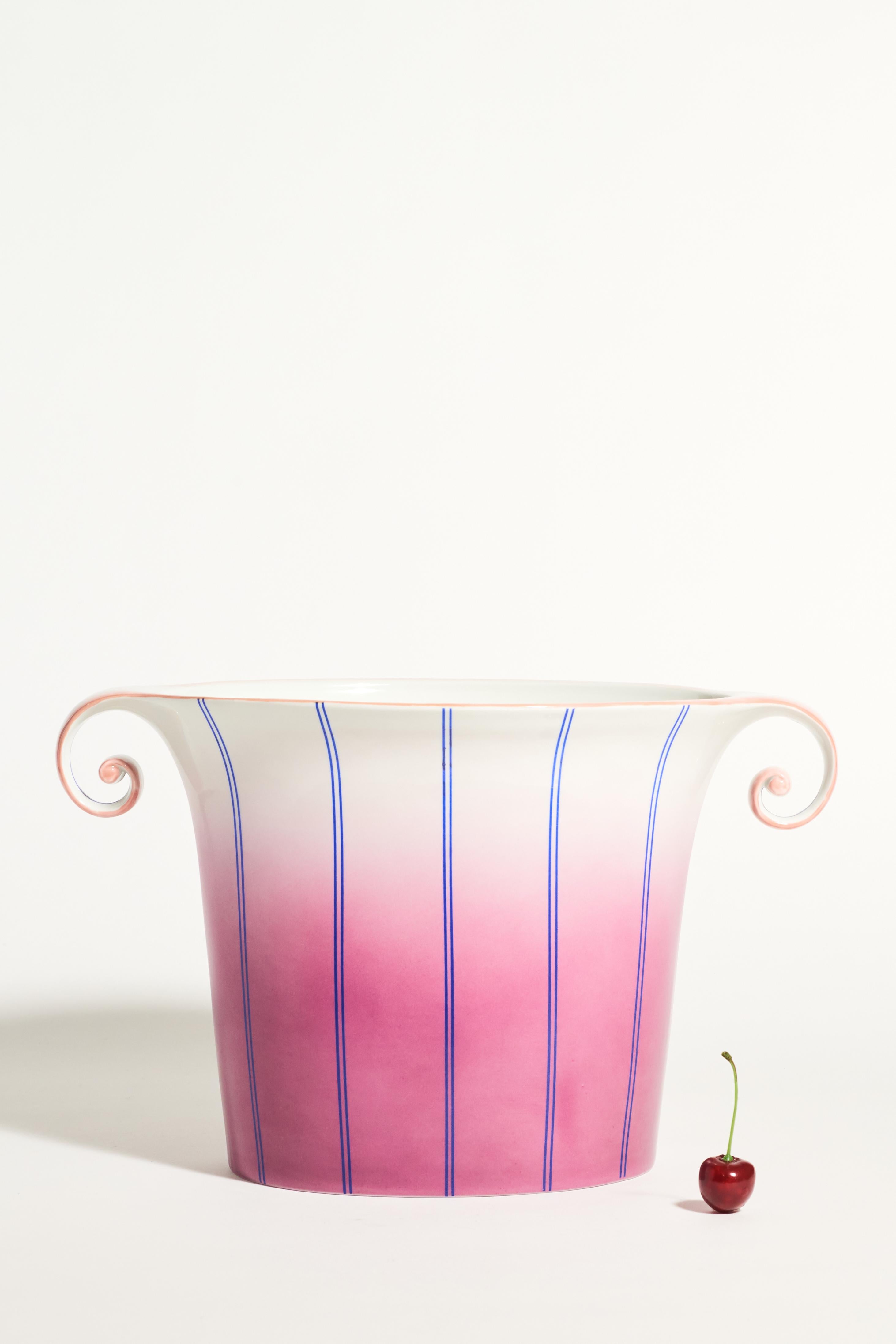 Beautiful sculptural hand painted Italian porcelain vase in shaded fuchsia and white, the lip and handles delicately outlined in paler pink, fine blue lines define the slightly flared shape and the nicely scrolled handles.

 