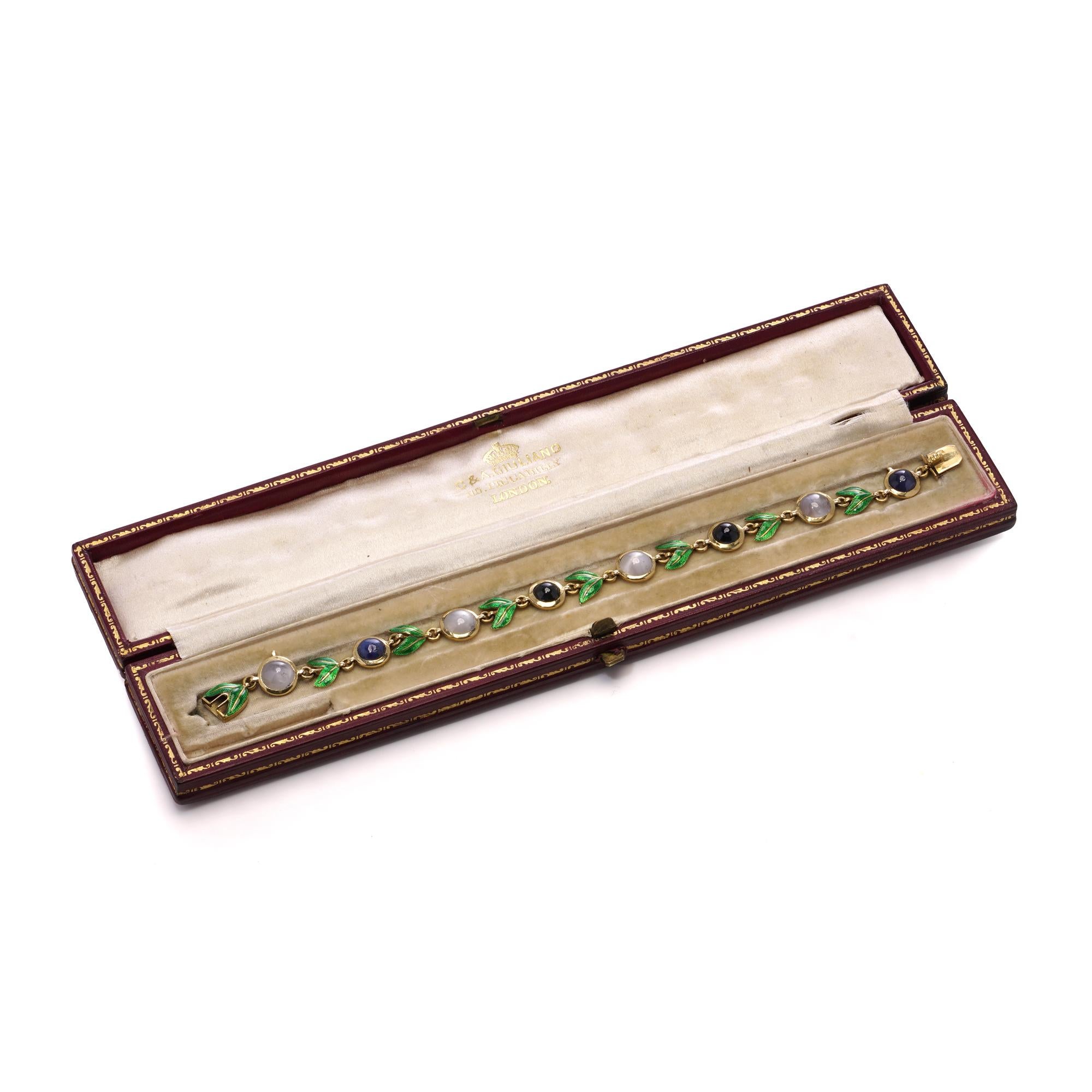 This exquisite bracelet by C&A Giuliano, a renowned Victorian-era jeweller, is crafted in 18kt gold and showcases a harmonious blend of colourful cabochon sapphires and moonstones. The bracelet features four sapphires and four moonstones, each