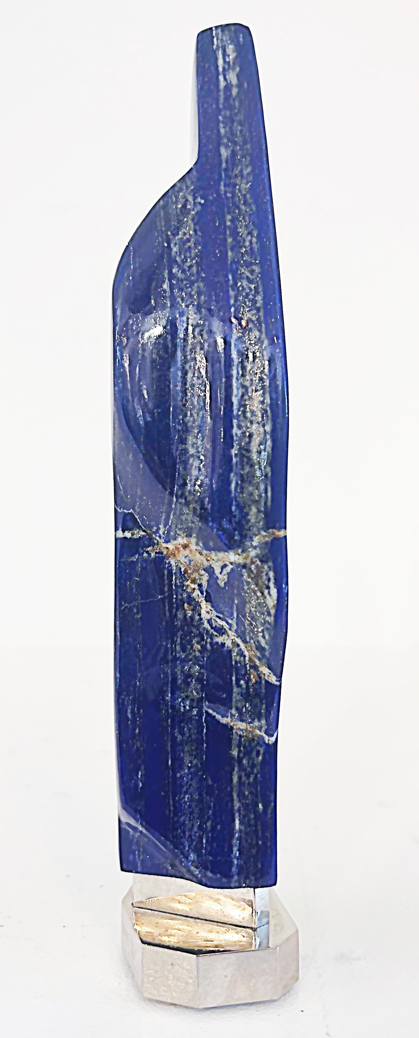 Giuliano Tincani Lapis Lazuli Specimen Sculpture on Nickel Plated Brass Base

Offered for sale is a one-of-a-kind large Lapis Lazuli specimen that was searched for and selected by Giuliano Tincani for its individual characteristics. Tincani then
