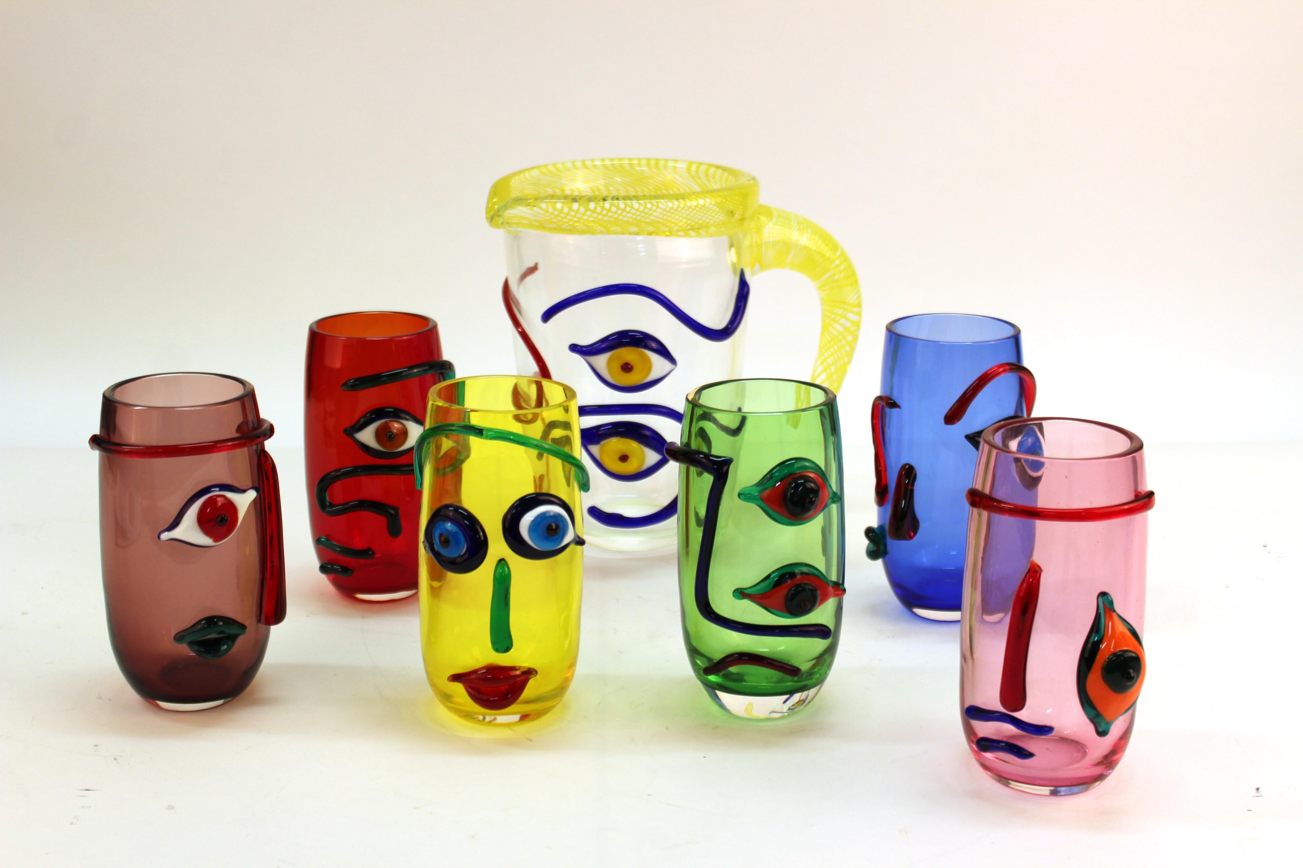 Italian Murano glass decanter and tumbler set designed by Maestro Giuliano Tosi. The multicolored set of tumbler and six unique glasses is from the limited 'Pablo' series, inspired by Pablo Picasso and was hand blown in Italy in 2004.