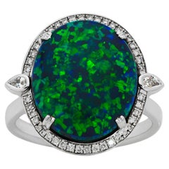 Giulians 18K 6.76ct Australian Black Opal and Diamond Halo Ring