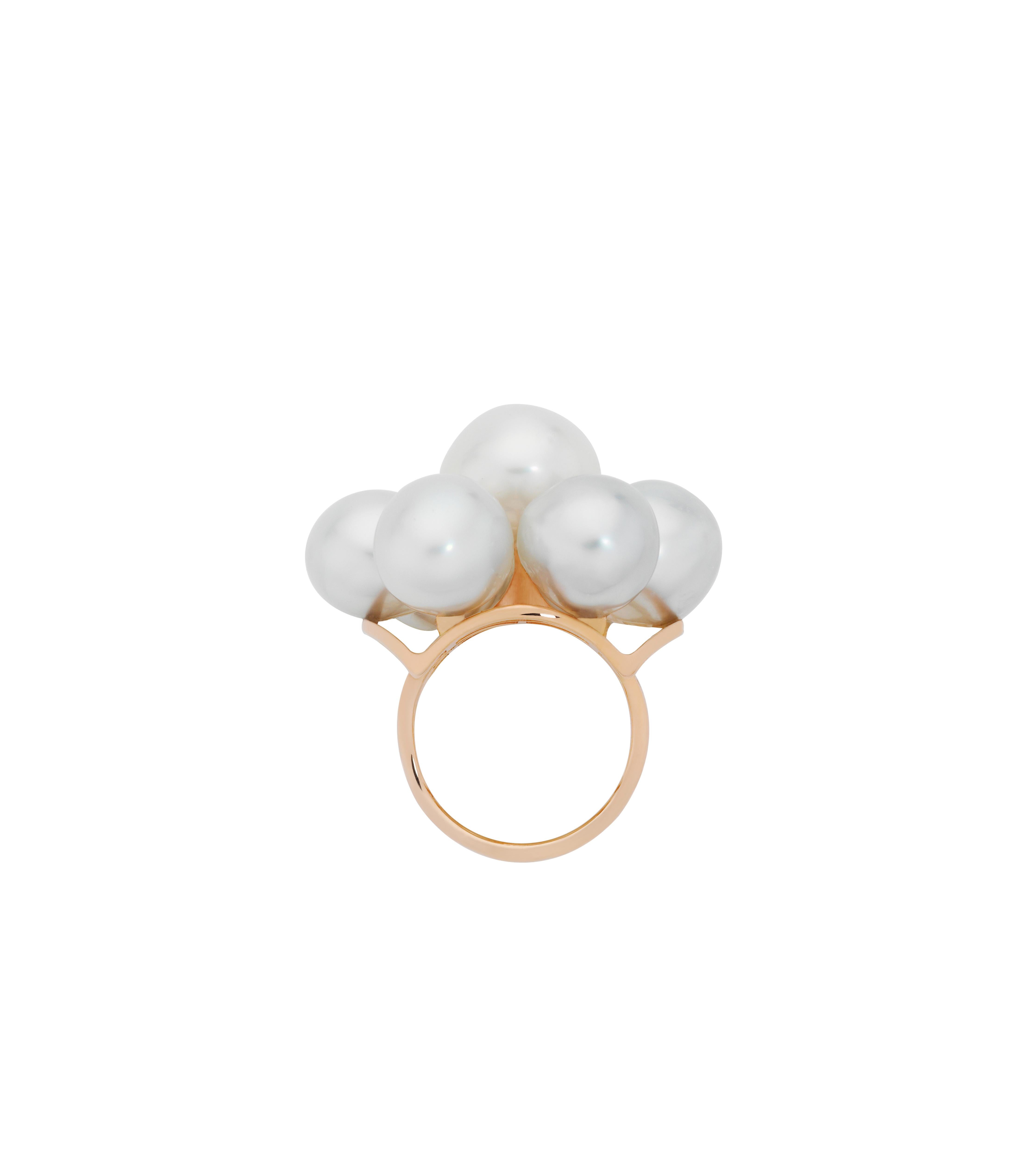 Giulians 7 Baroque South Sea Pearl Cocktail Ring in 18 karat Rose Gold.  This glamorous dress ring features a cluster of Australian South Sea Baroque pearls, sitting atop an 18 karat rose gold star-shaped gallery.  The outer six pearls are 11 -