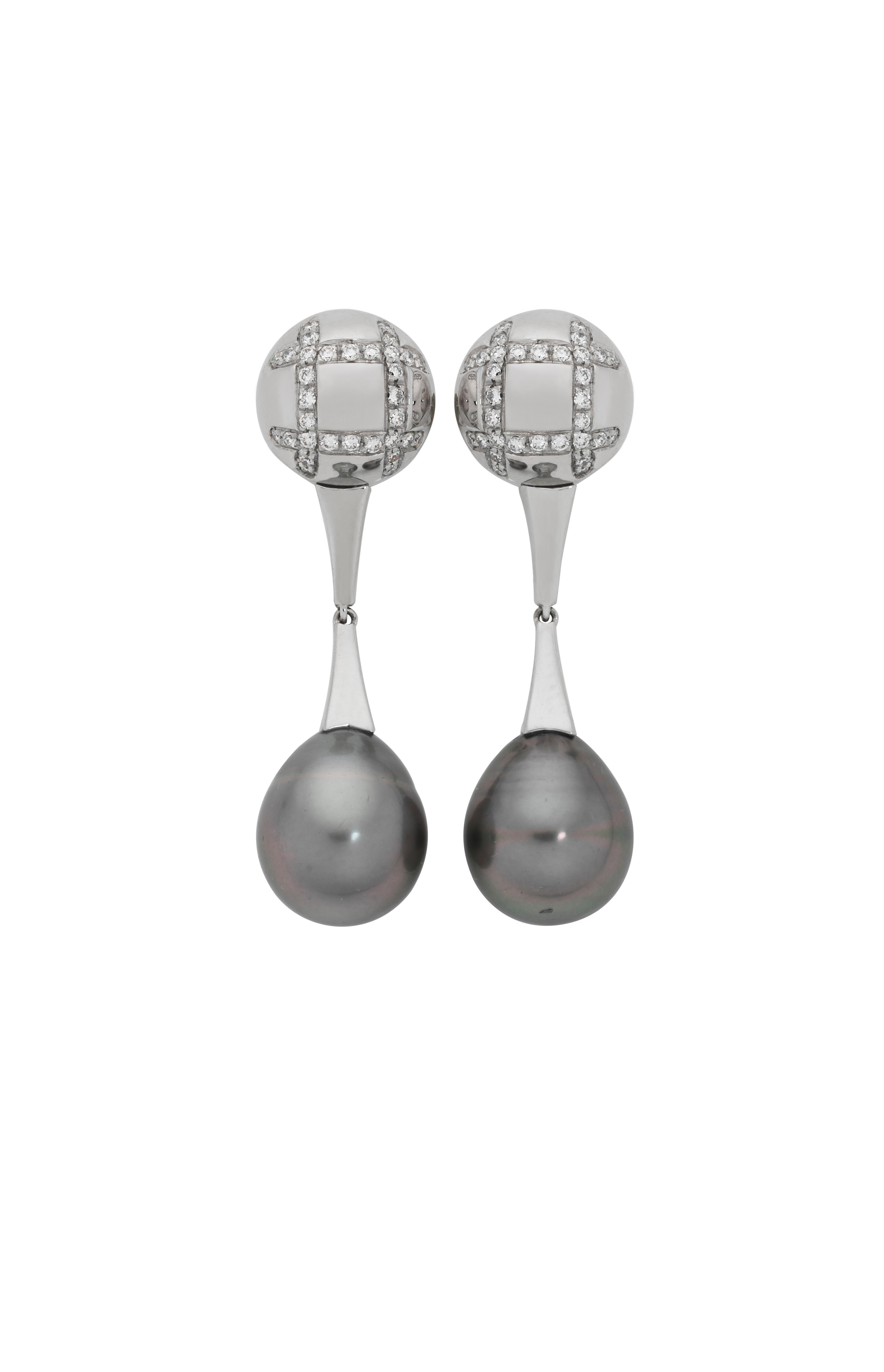 Giulians Art Deco inspired 18k white gold handcrafted Tahitian black cultured South Sea pearl and diamond drop Earrings. Each earring features a 12mm drop shape Tahitian cultured South Sea Pearl, with soft grey and aubergine hues.  The 18 karat