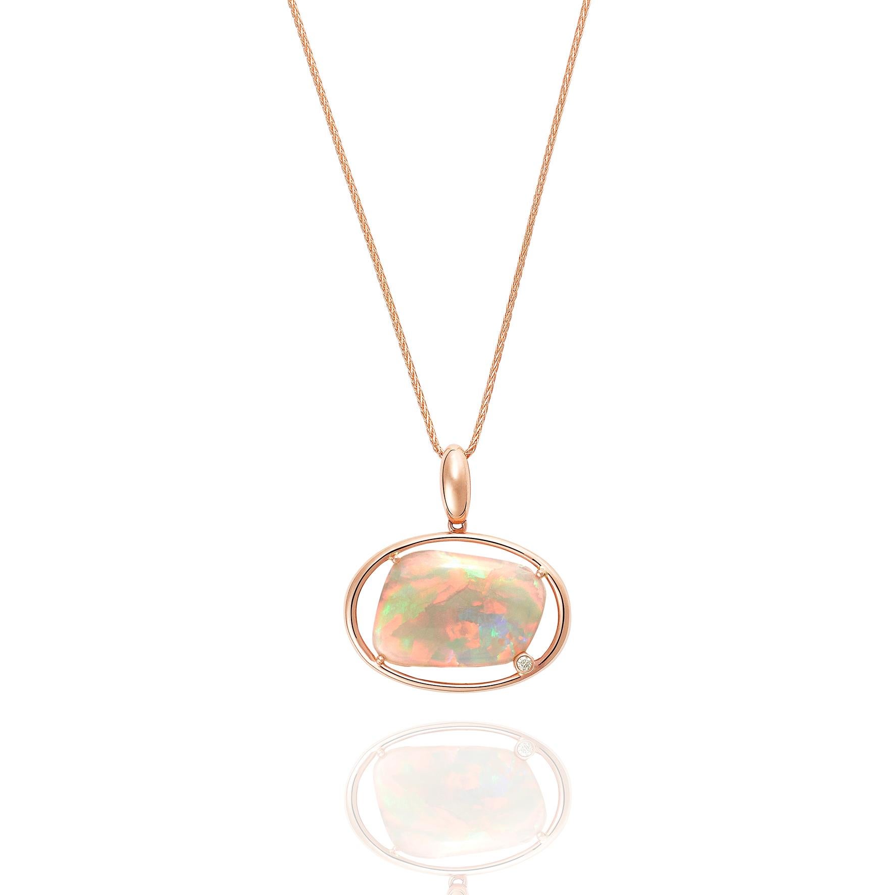 Giulians handcrafted 18 karat rose gold Australian White Opal and Diamond Pendant Necklace.  This contemporary pendant features a 4.14ct natural solid crystal opal with light color and bright pastel fire.  The opal is set in 4 prongs within an 18
